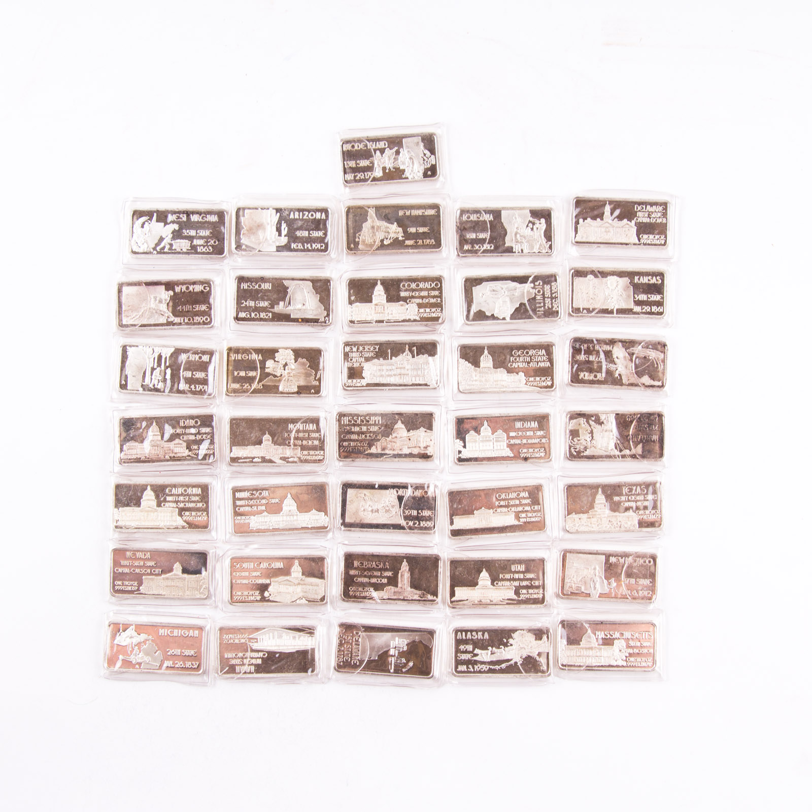 Large Grouping of Hamilton Mint State Themed One Troy Ounce .999 Silver Ingots