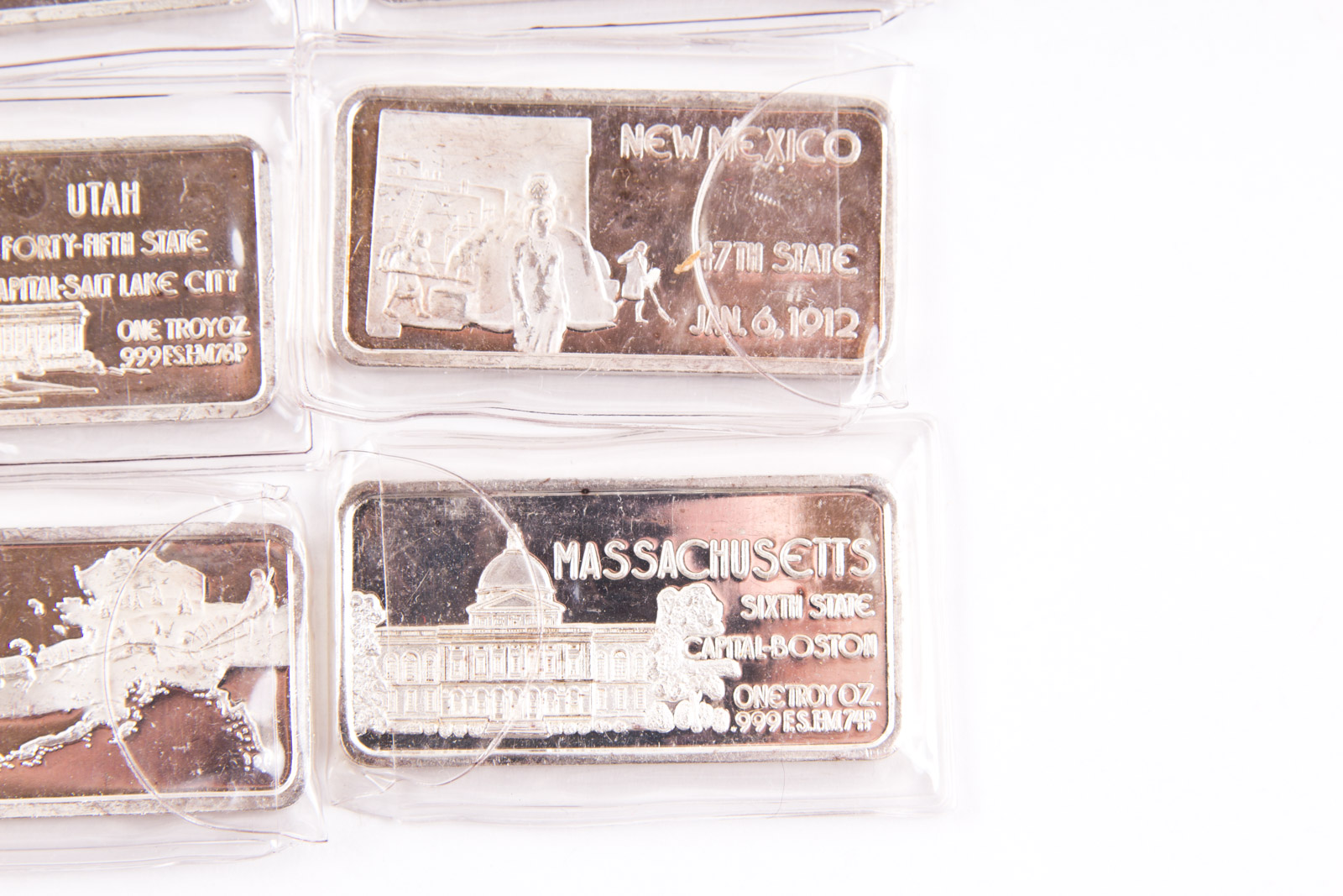 Large Grouping of Hamilton Mint State Themed One Troy Ounce .999 Silver Ingots