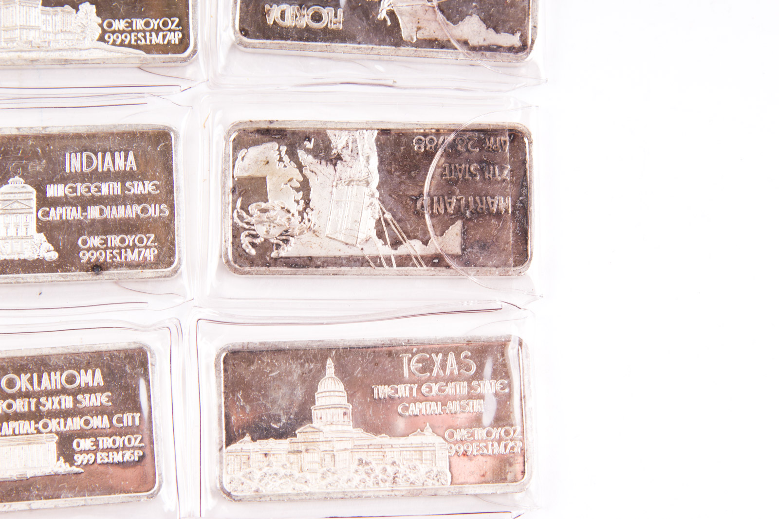 Large Grouping of Hamilton Mint State Themed One Troy Ounce .999 Silver Ingots