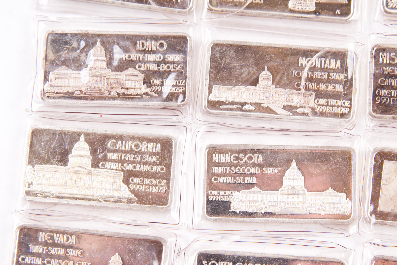 Large Grouping of Hamilton Mint State Themed One Troy Ounce .999 Silver Ingots