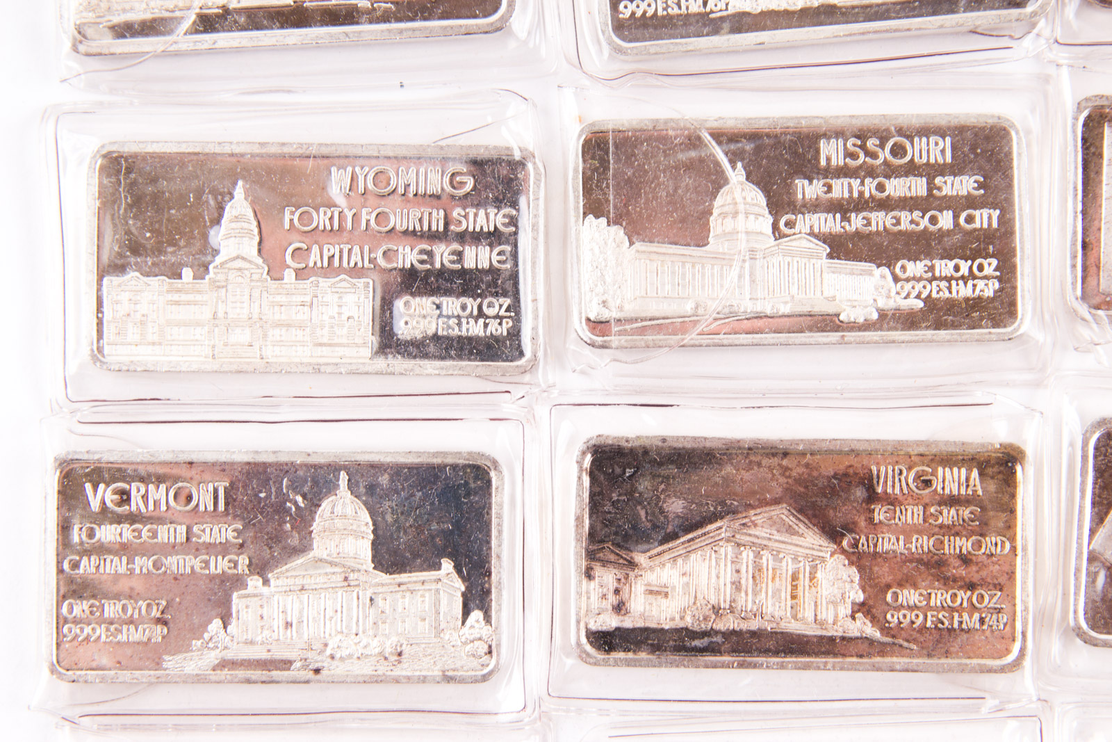 Large Grouping of Hamilton Mint State Themed One Troy Ounce .999 Silver Ingots