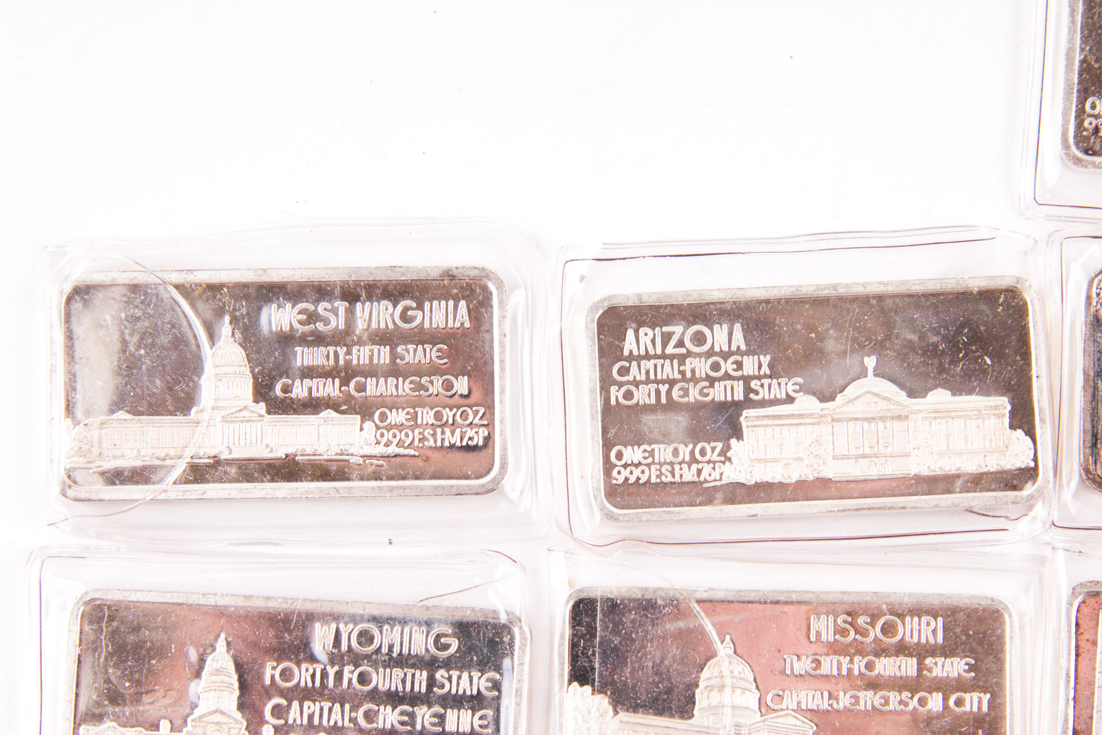 Large Grouping of Hamilton Mint State Themed One Troy Ounce .999 Silver Ingots