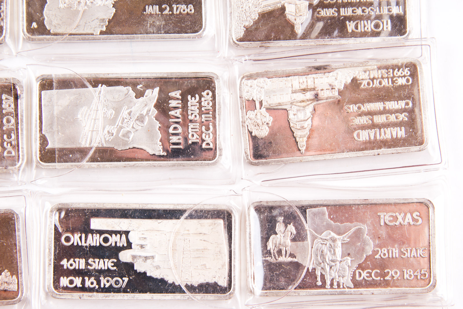 Large Grouping of Hamilton Mint State Themed One Troy Ounce .999 Silver Ingots