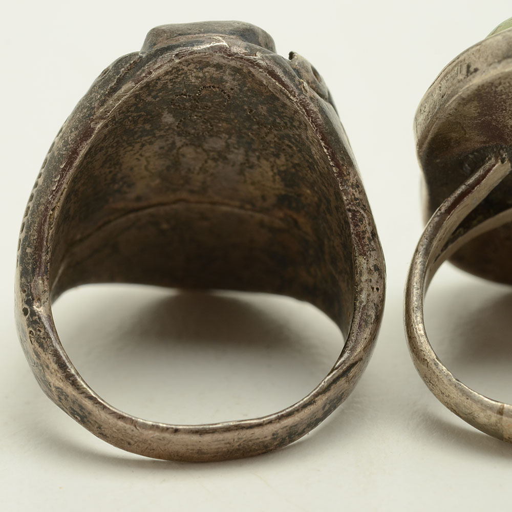 Four Sterling Rings Featuring Turquoise, Coral and Fire Agate