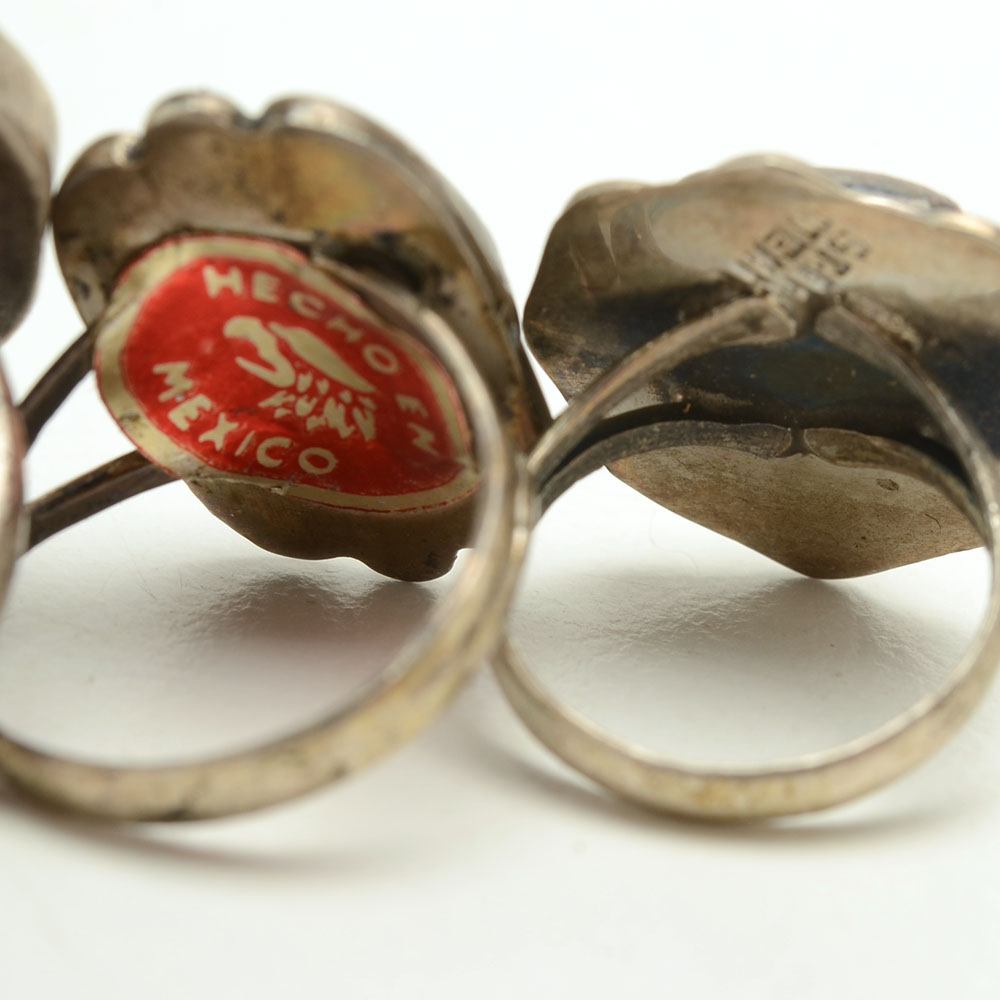 Four Sterling Rings Featuring Turquoise, Coral and Fire Agate