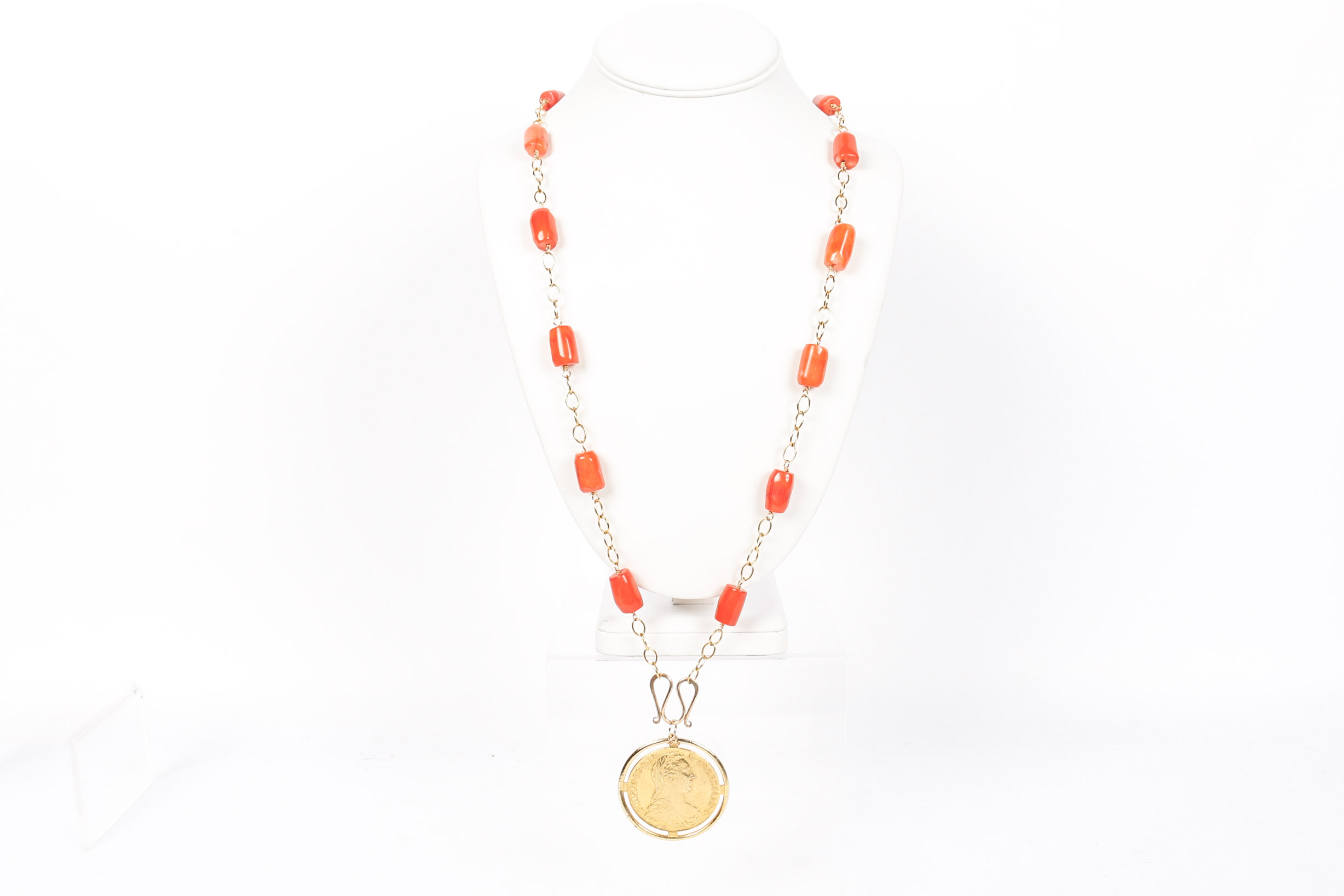 Chanel Earrings With a Coral Coin Pendant Necklace