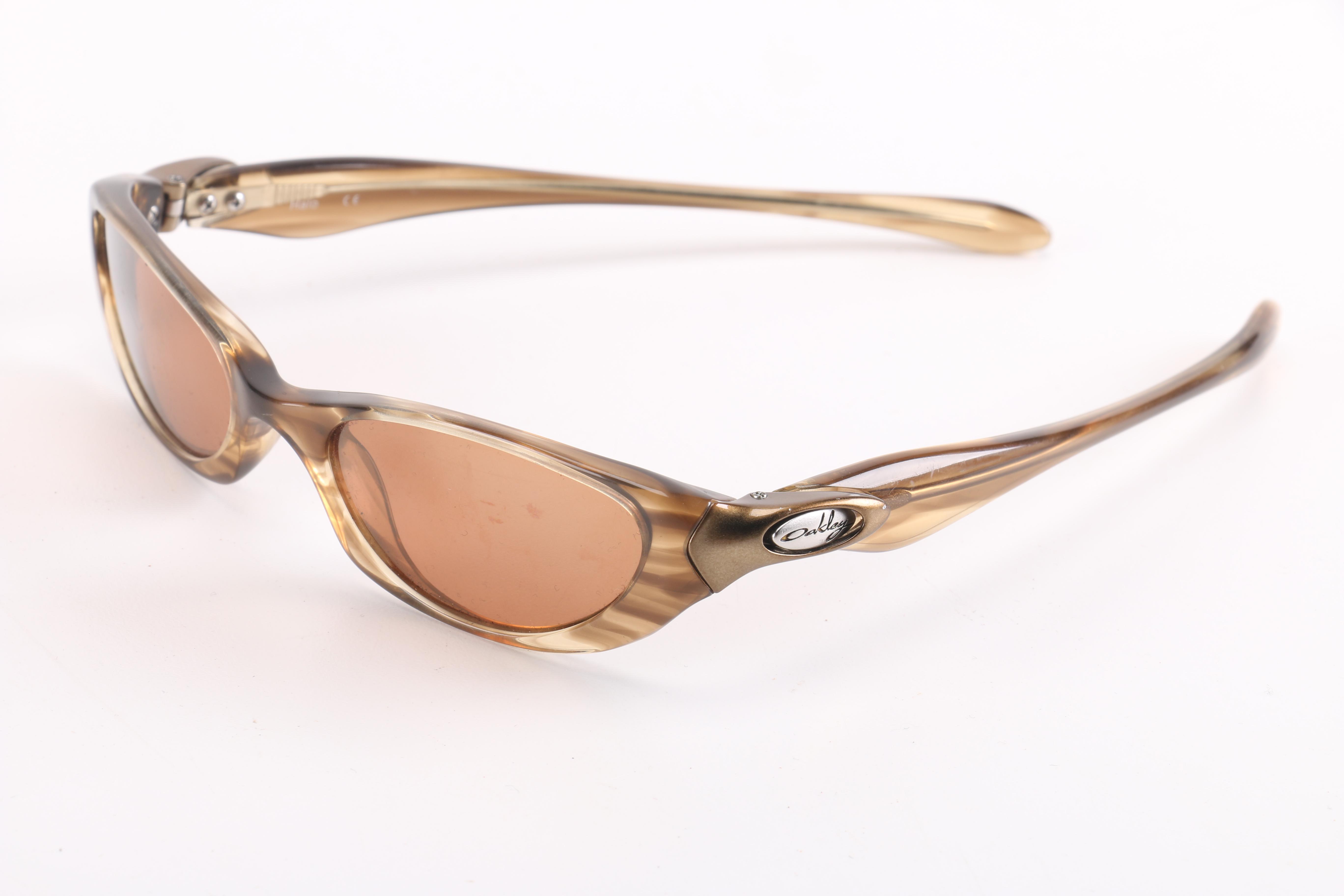 Selection of Sunglasses Including Oakley and Juicy Couture