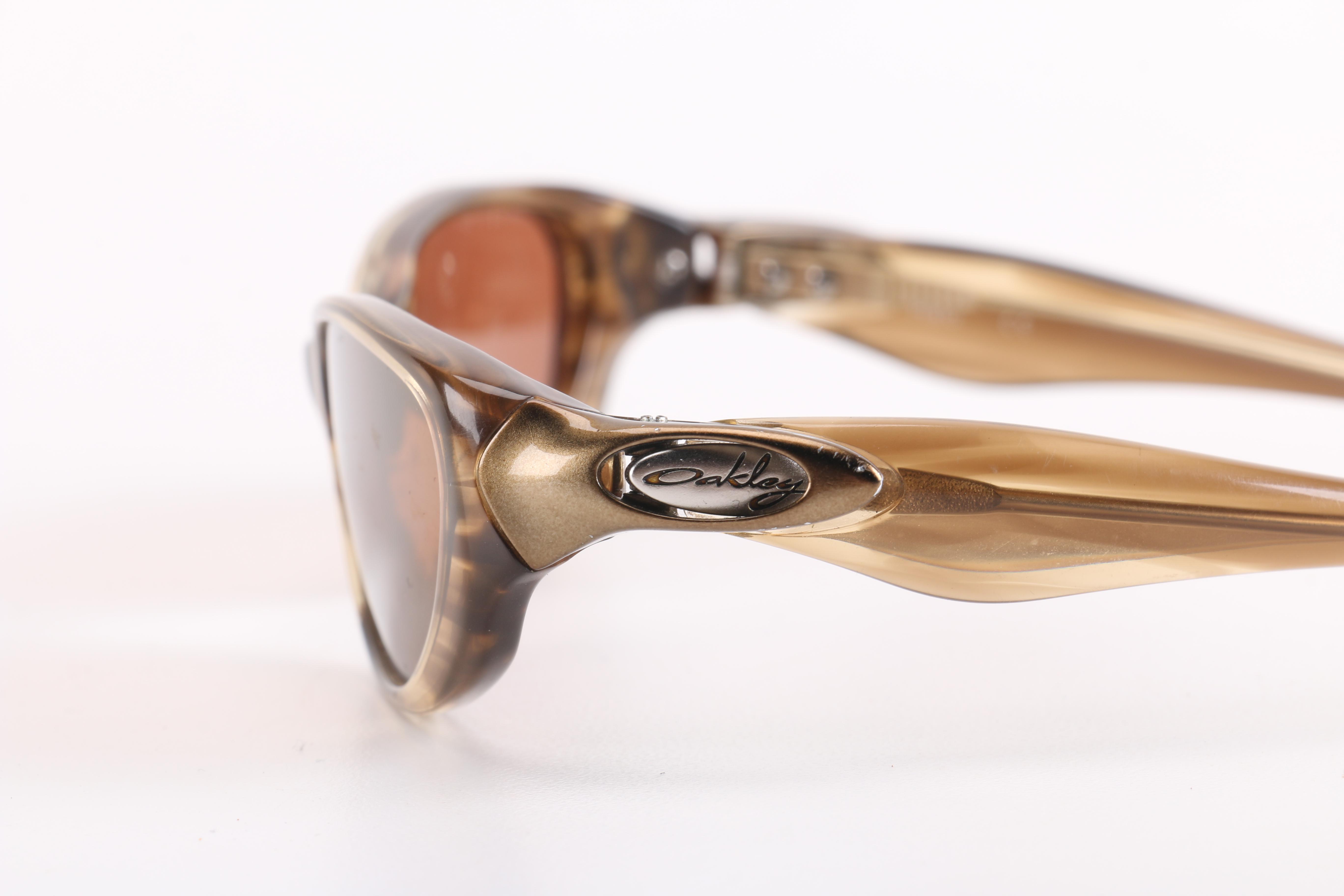 Selection of Sunglasses Including Oakley and Juicy Couture