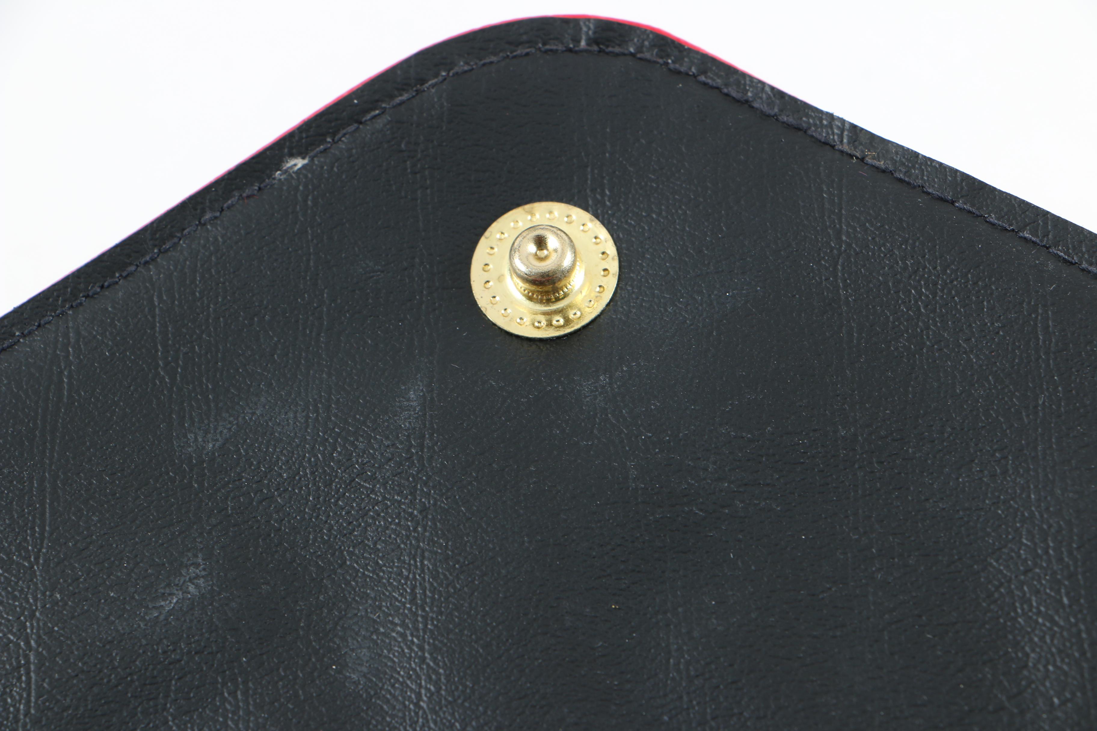 Collection of Leather and Snakeskin Clutches