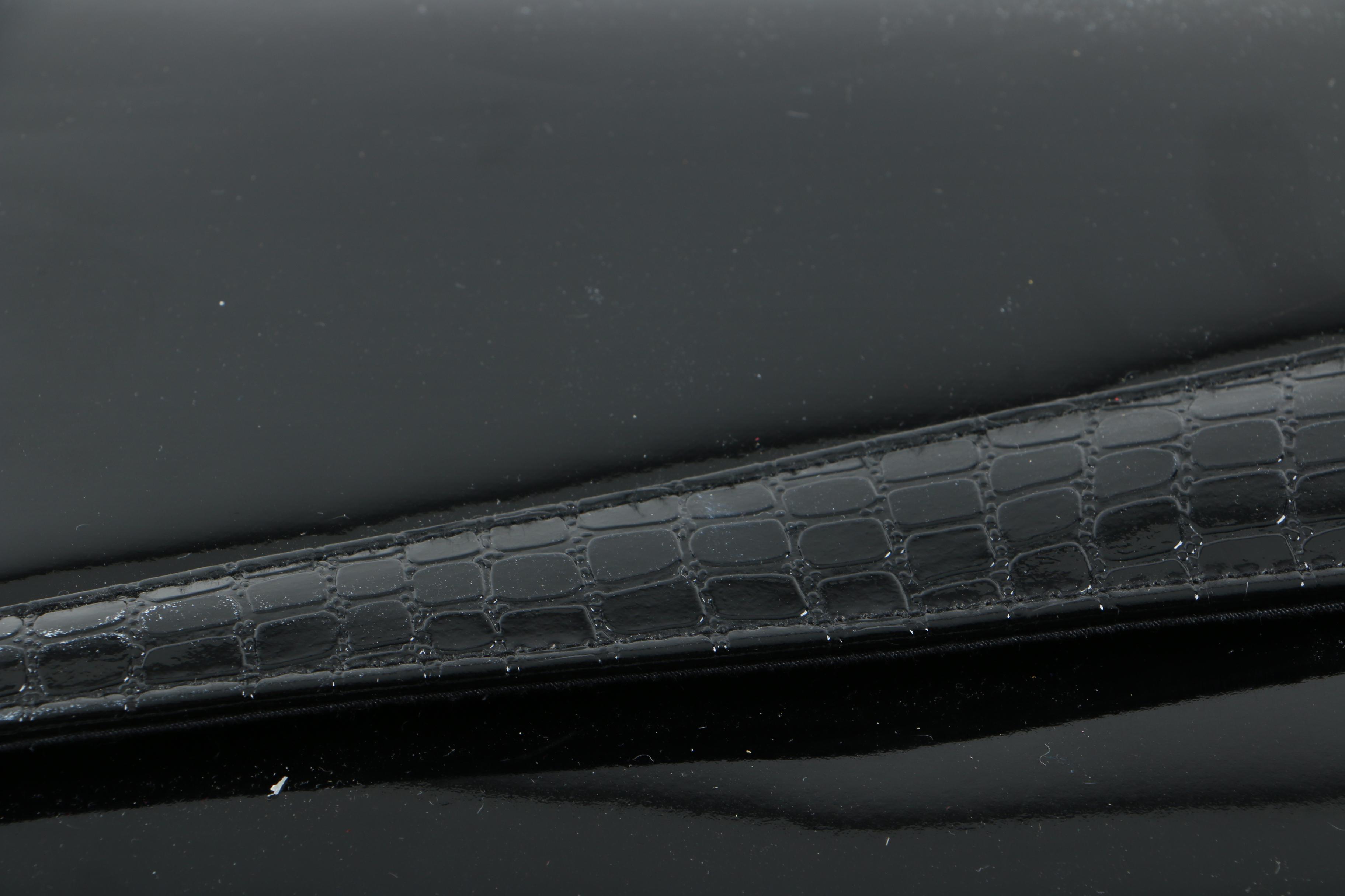 Collection of Leather and Snakeskin Clutches