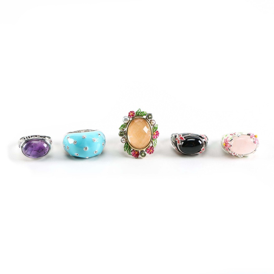 Sterling Silver Rings with Floral Motifs and Gemstones