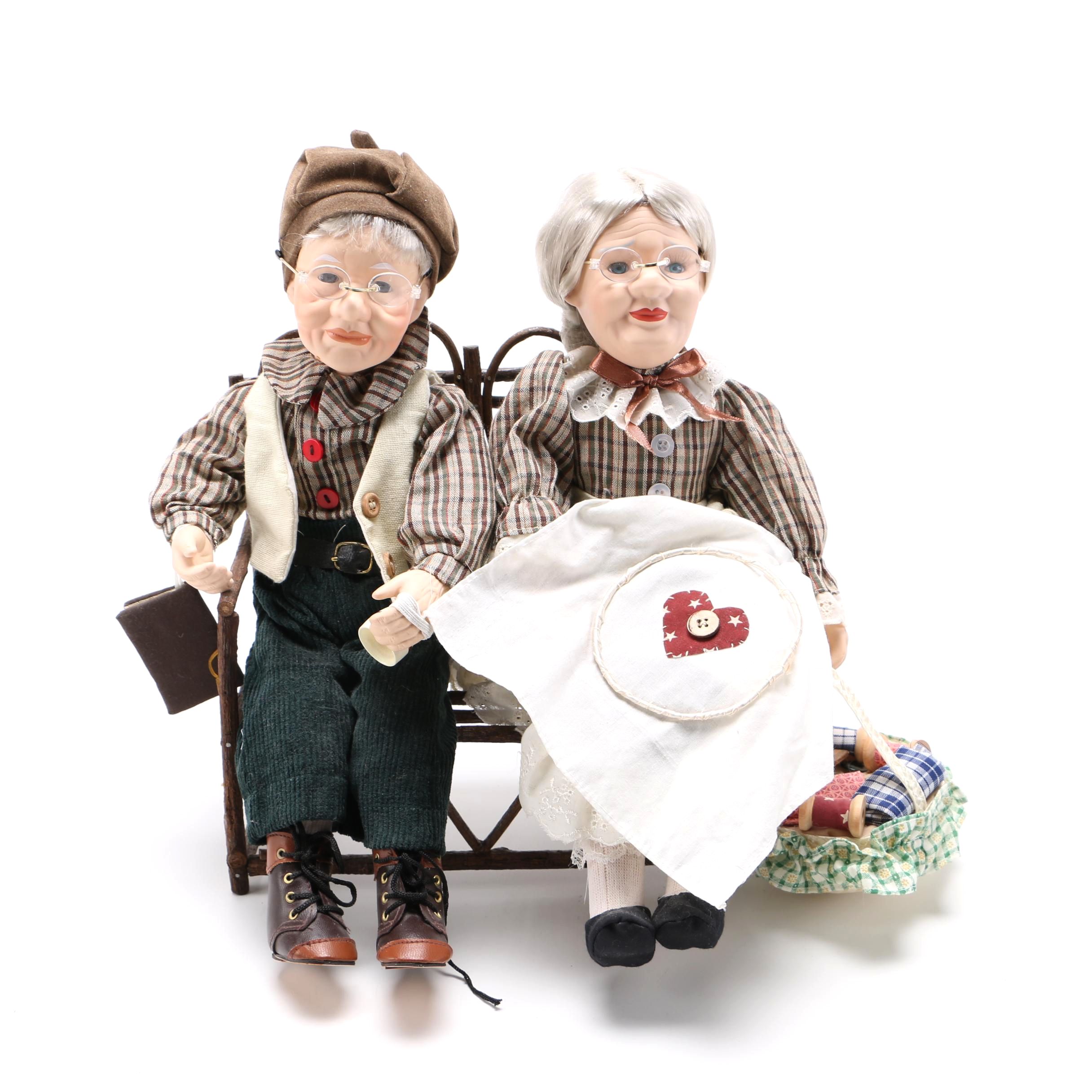 Dolls of Elderly Couple on a Heart Cane Bench