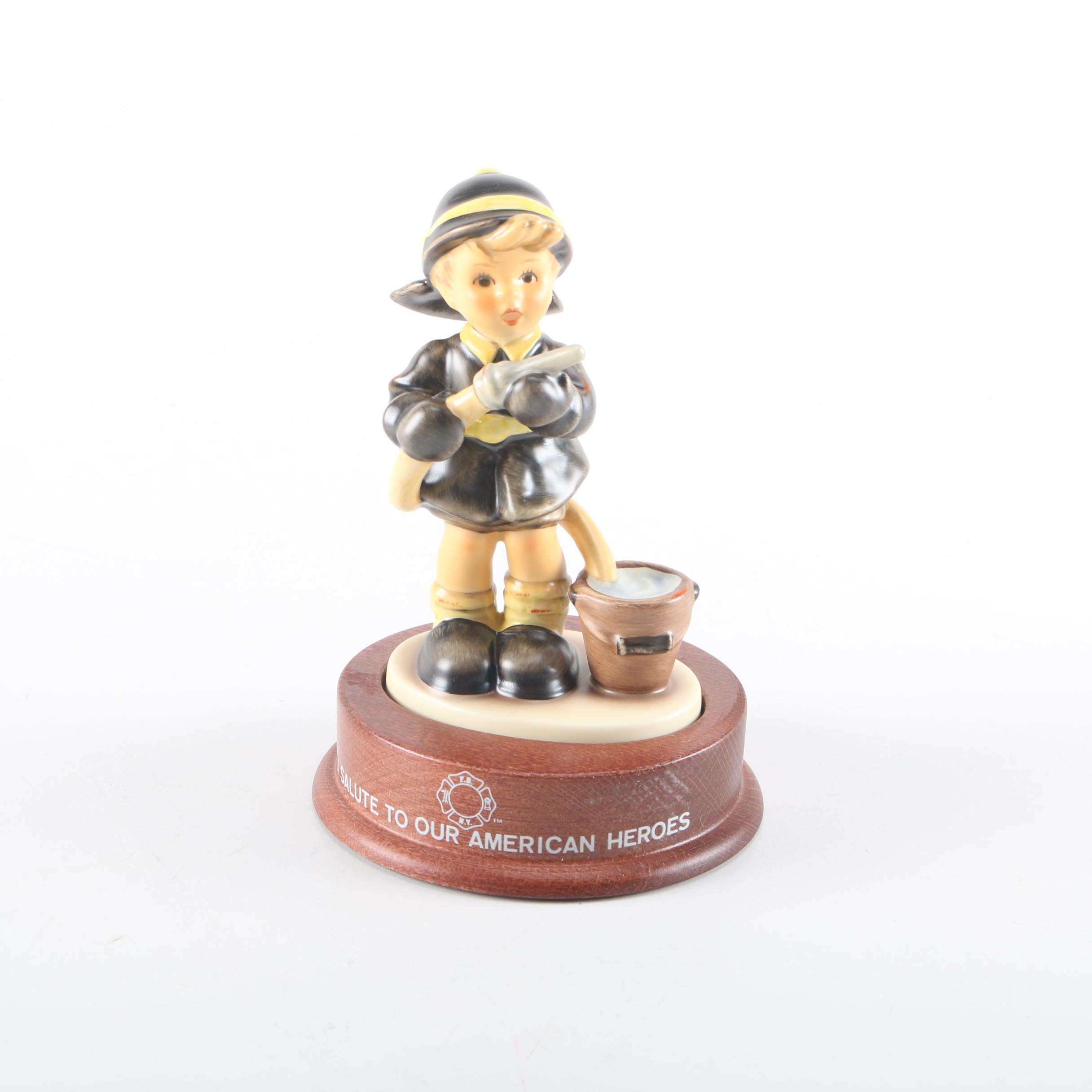 2000 Limited Edition Hummel "Fire Fighter" Ceramic Figurine and "American Heroes" Stand