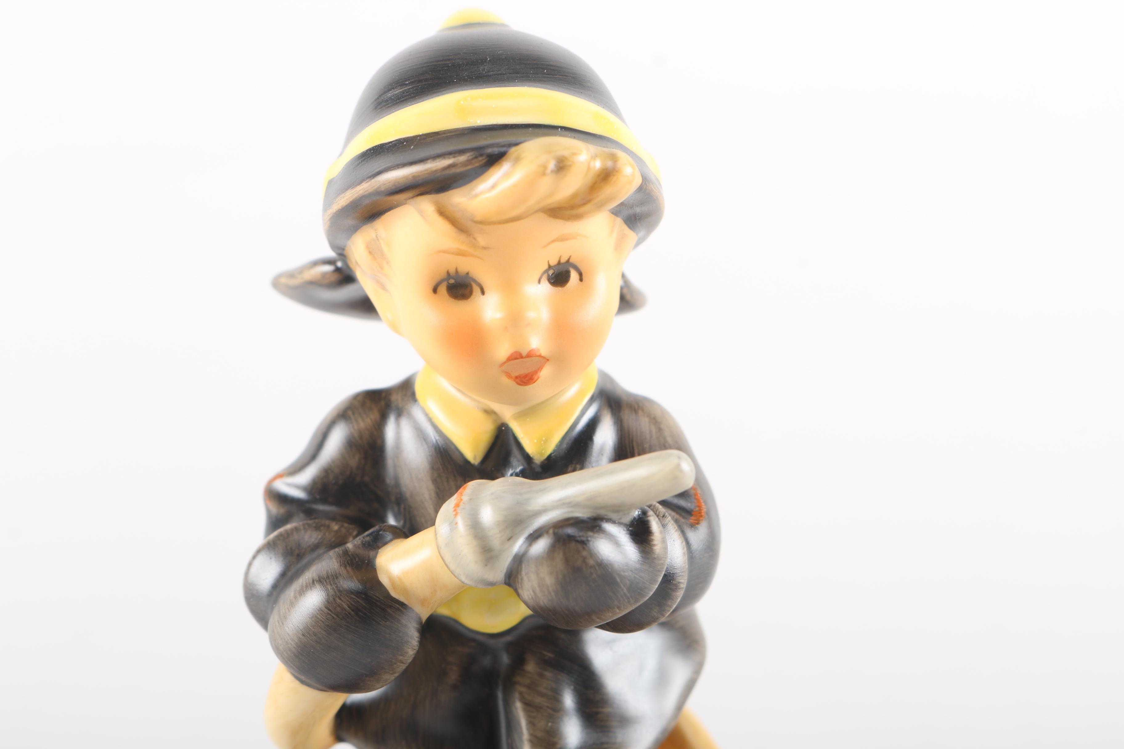 2000 Limited Edition Hummel "Fire Fighter" Ceramic Figurine and "American Heroes" Stand