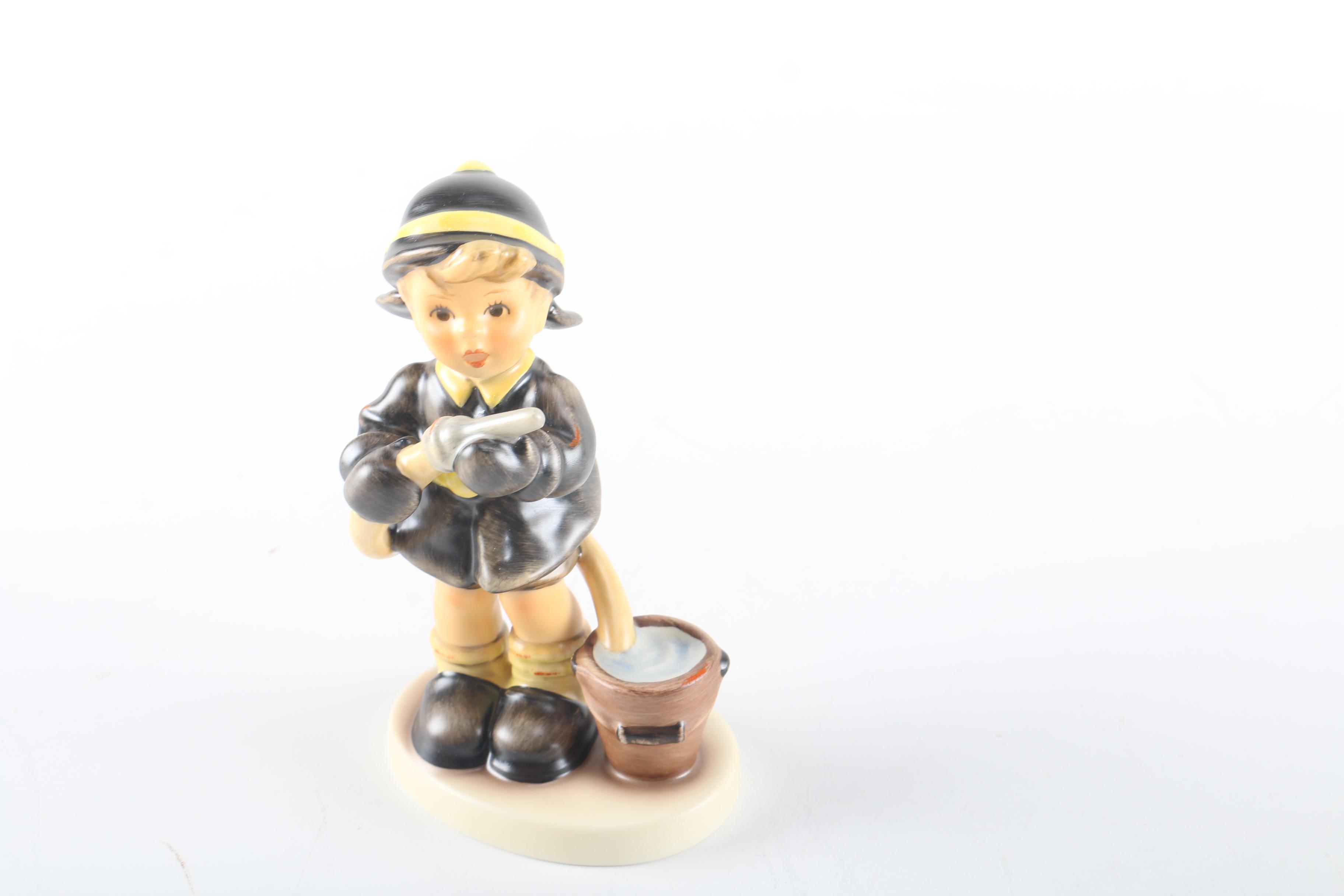 2000 Limited Edition Hummel "Fire Fighter" Ceramic Figurine and "American Heroes" Stand