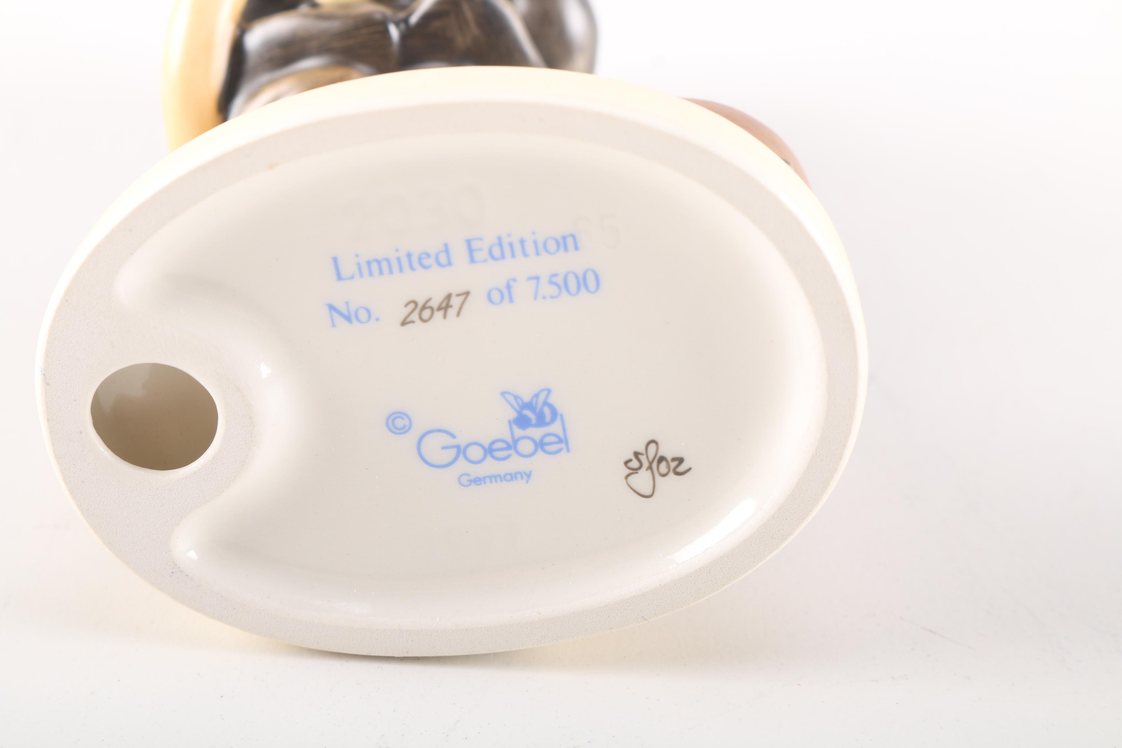 2000 Limited Edition Hummel "Fire Fighter" Ceramic Figurine and "American Heroes" Stand