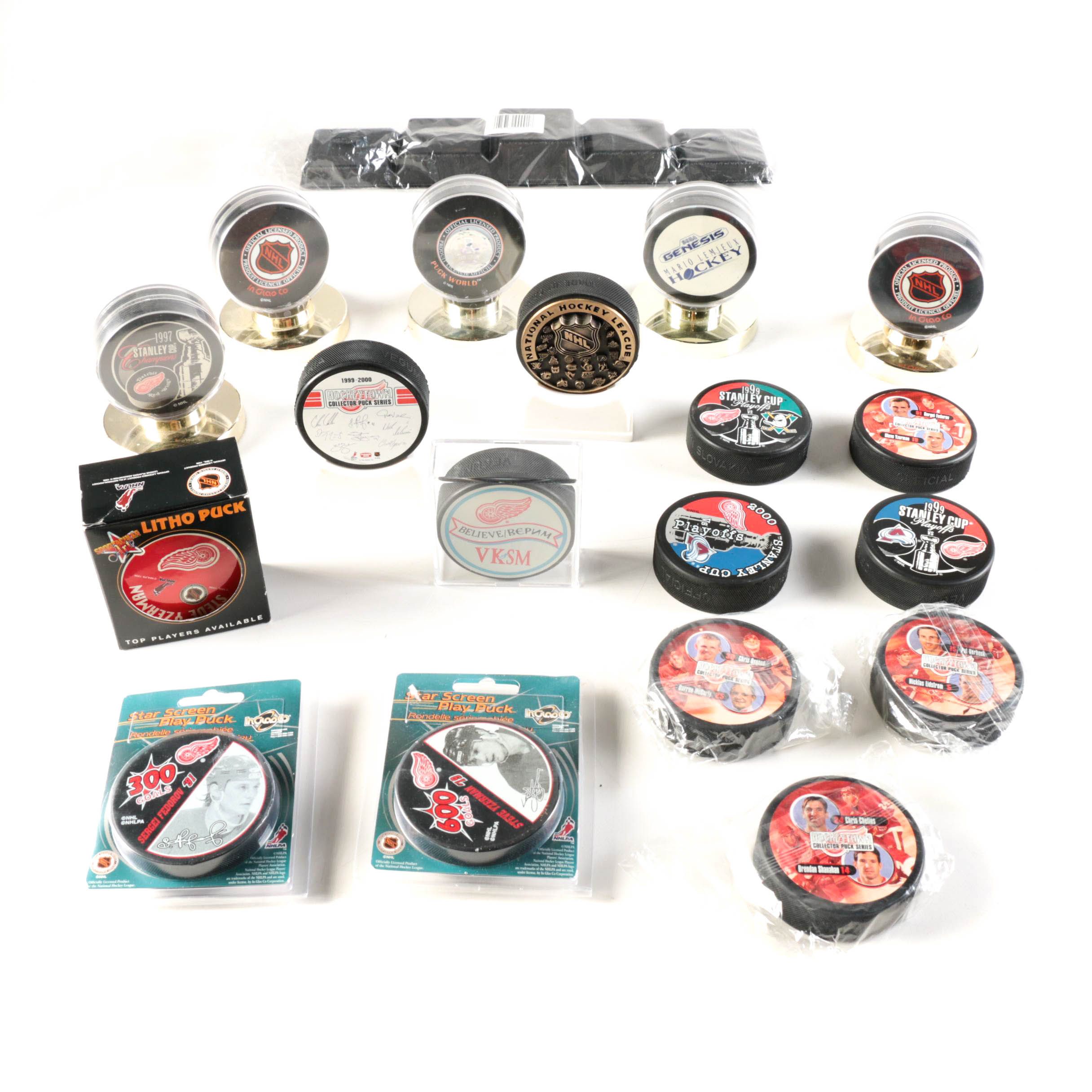 Assortment of Hockey Pucks