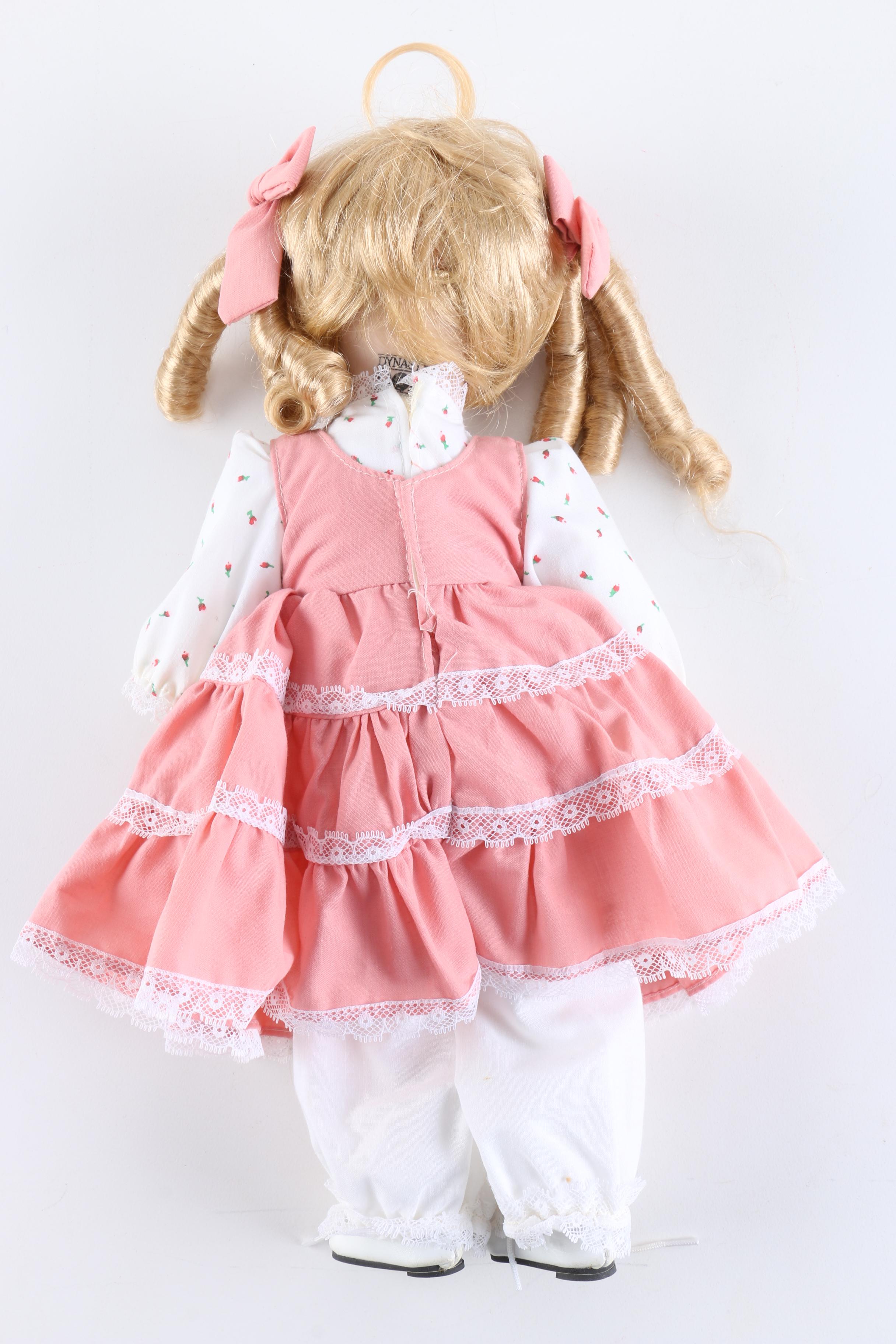 Porcelain Dolls Including a Dynasty Doll with Matching Bear