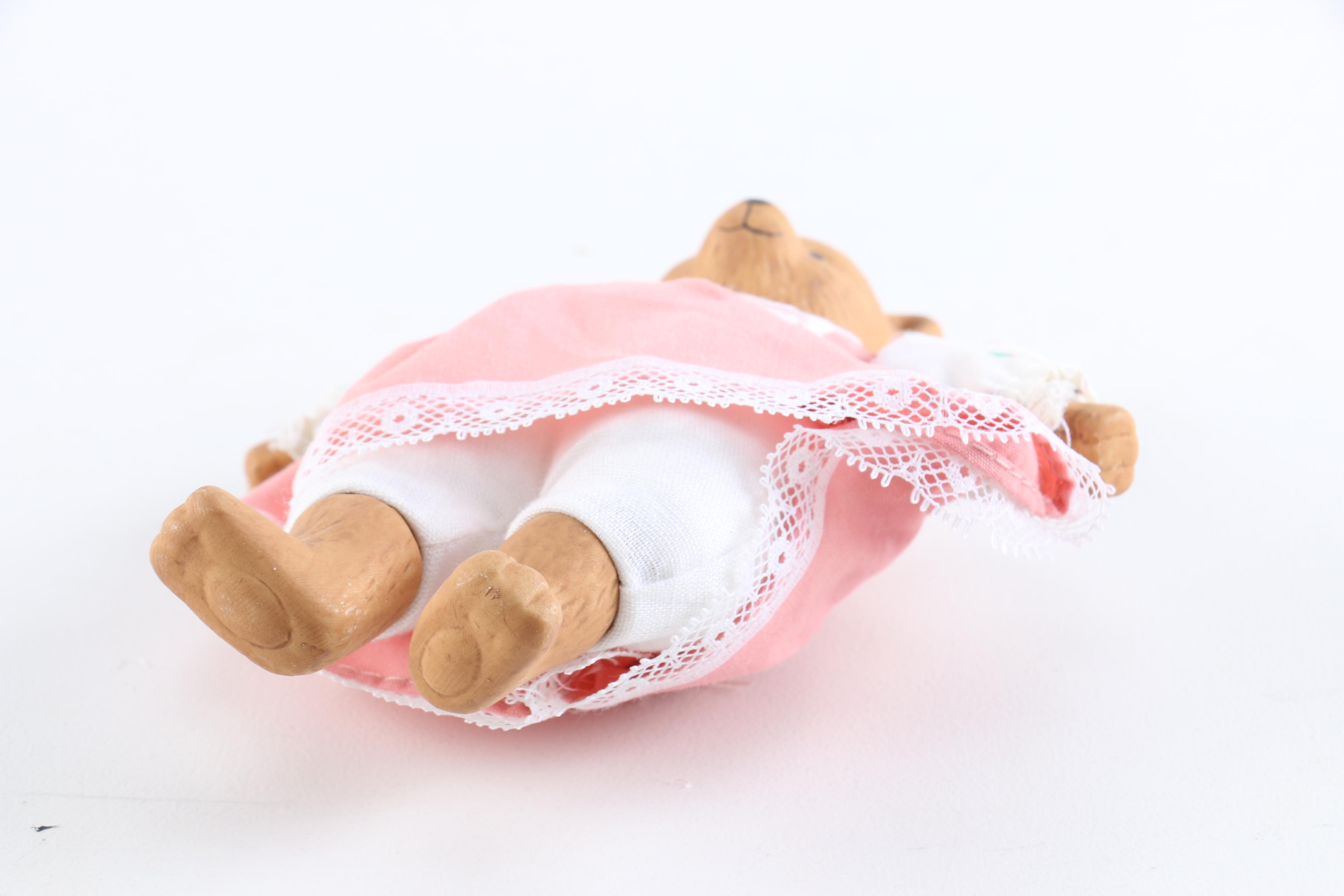 Porcelain Dolls Including a Dynasty Doll with Matching Bear