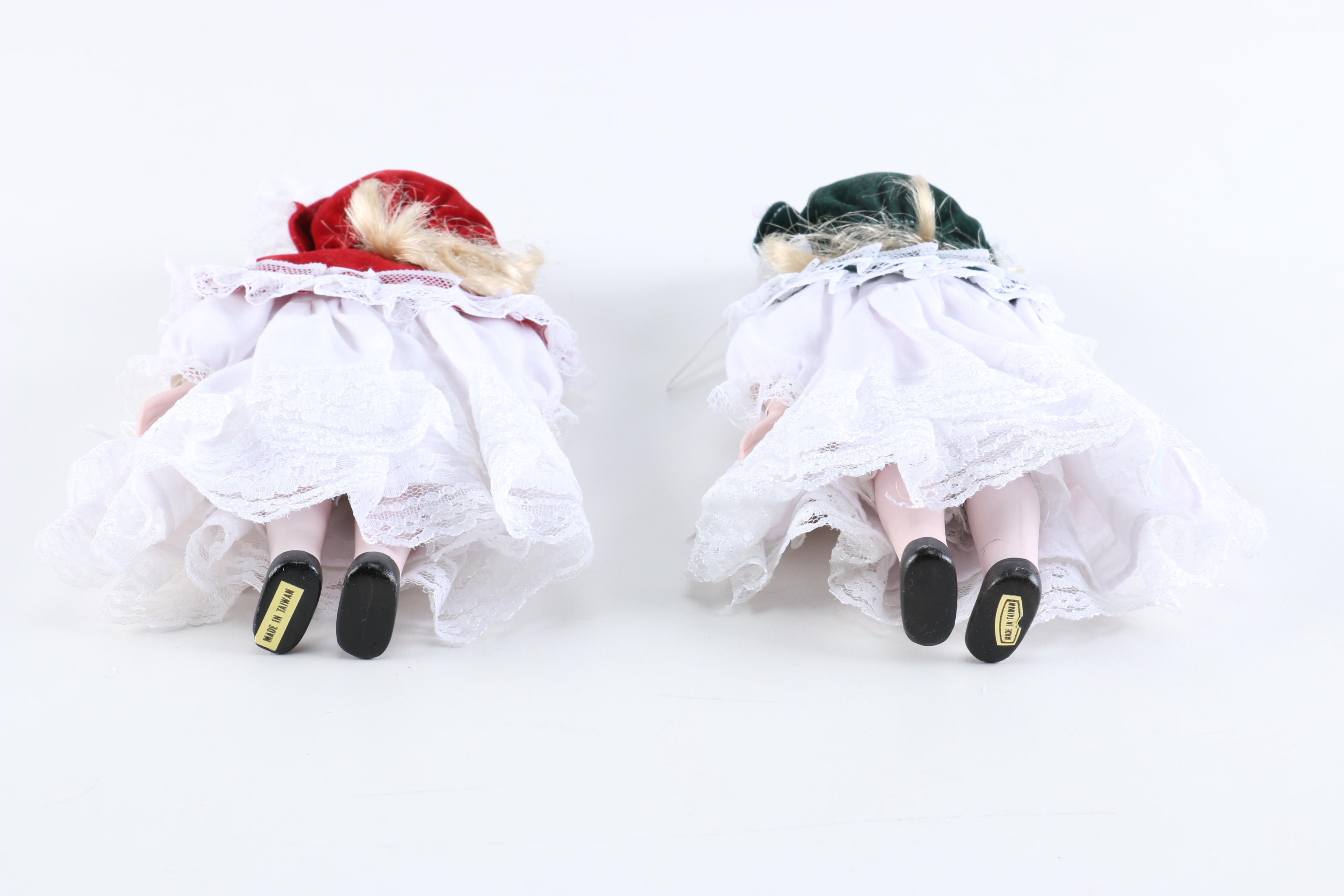 Porcelain Dolls Including a Dynasty Doll with Matching Bear