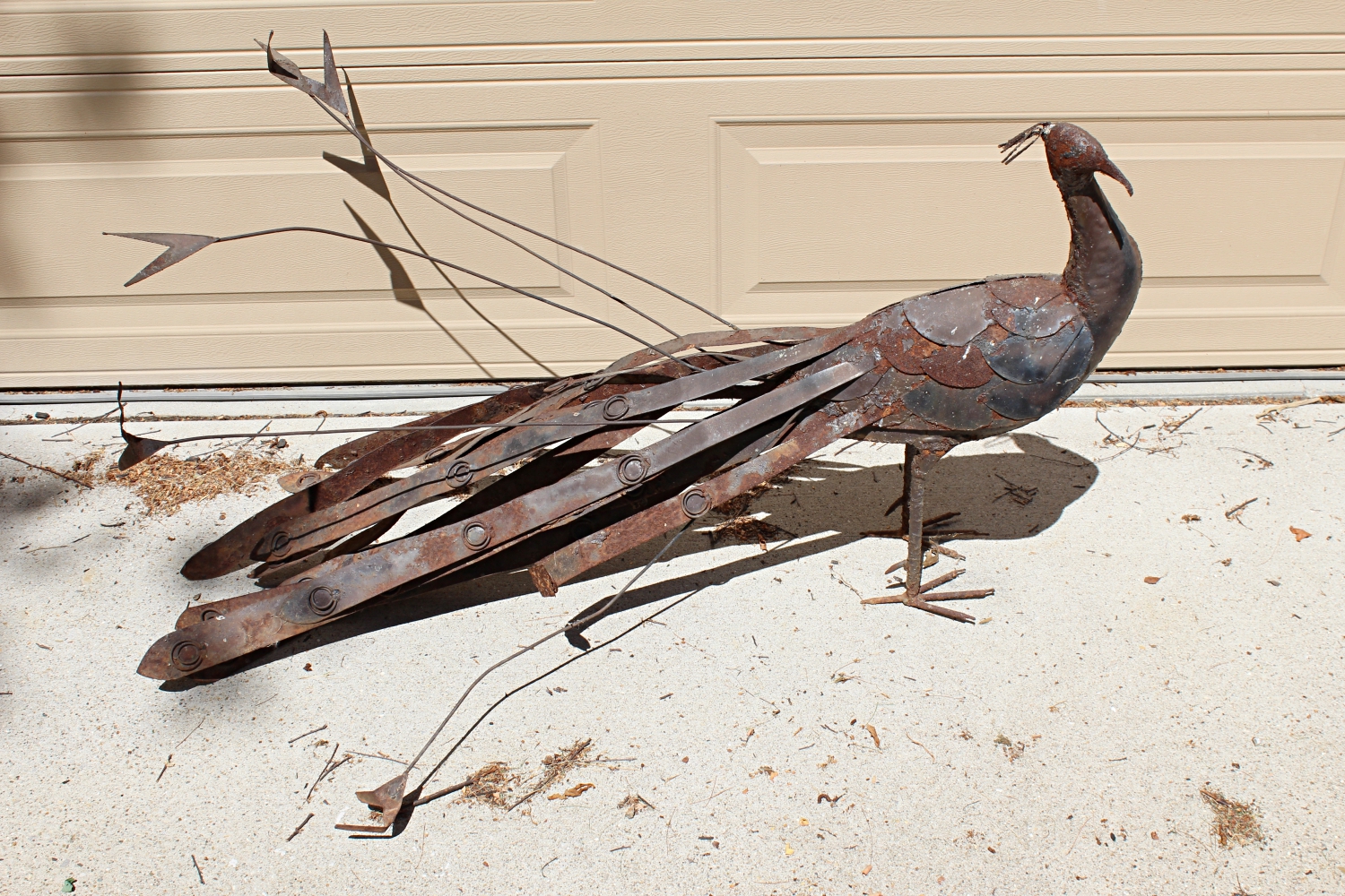 Peacock and Peahen Metal Sculptures