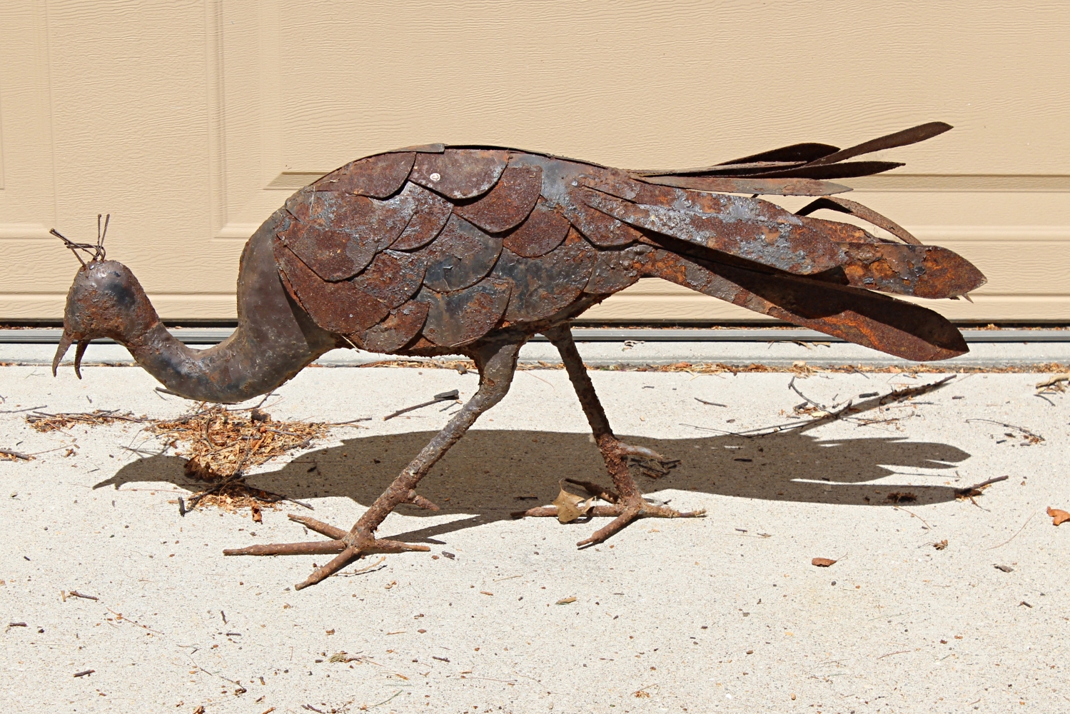 Peacock and Peahen Metal Sculptures
