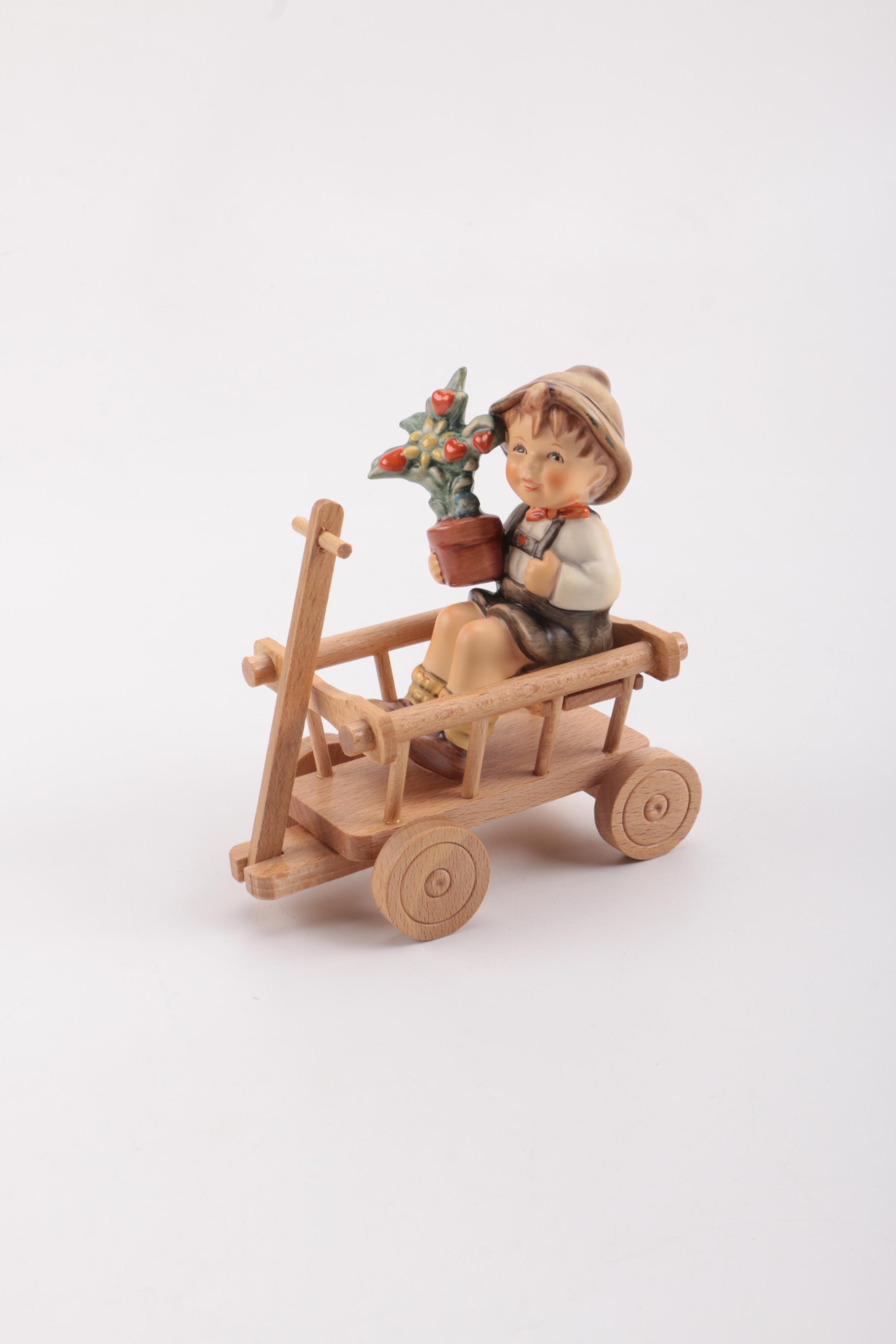 Boy in Wagon Hummel Figurine