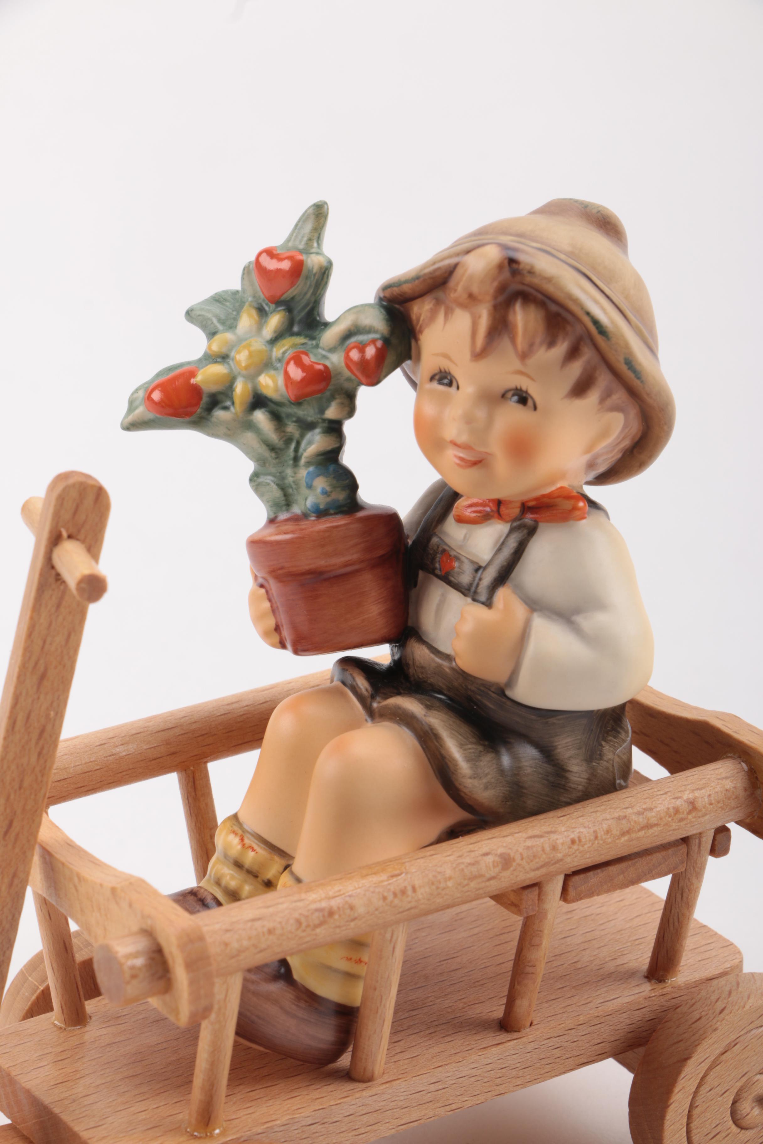 Boy in Wagon Hummel Figurine