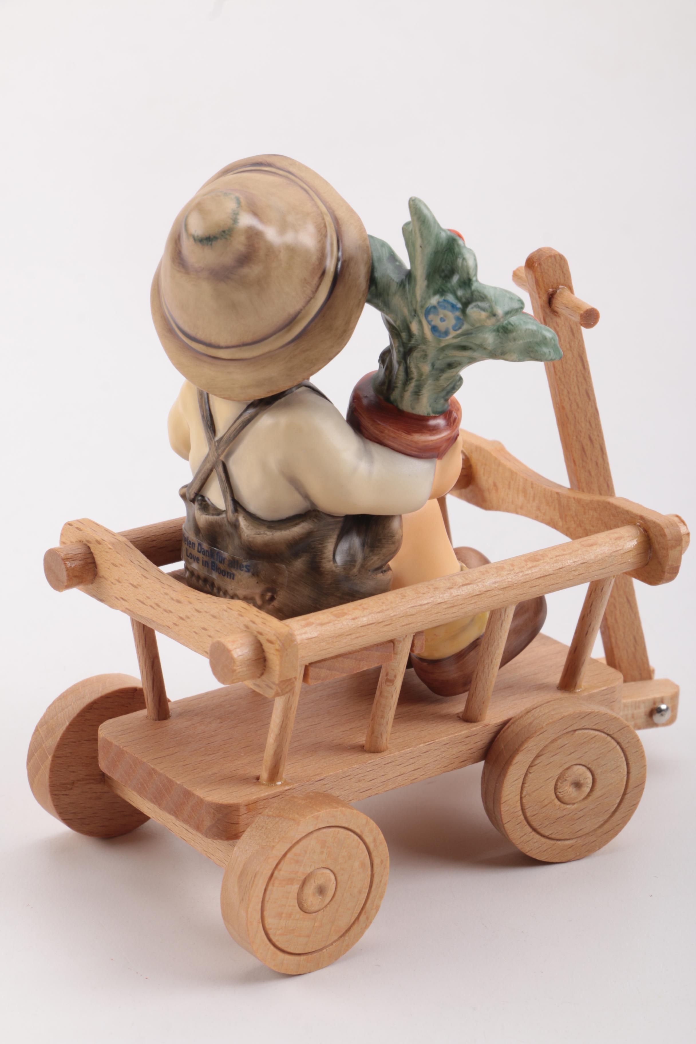 Boy in Wagon Hummel Figurine