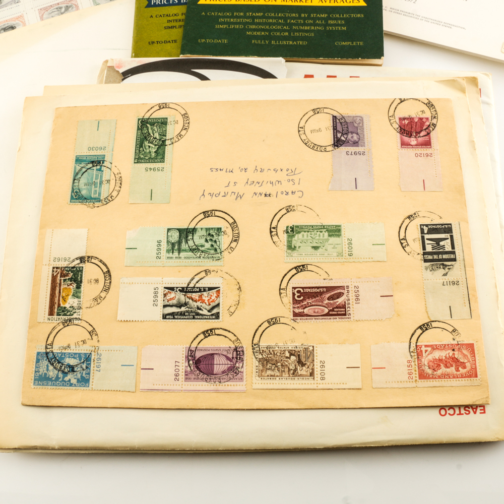 Collection of Stamps, Stamp Blocks, and Stamp Catalogs
