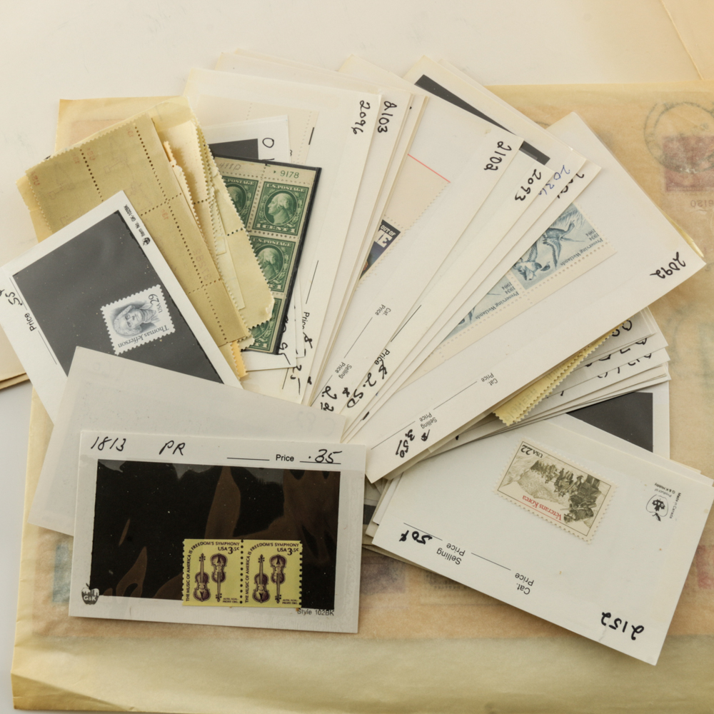 Collection of Stamps, Stamp Blocks, and Stamp Catalogs