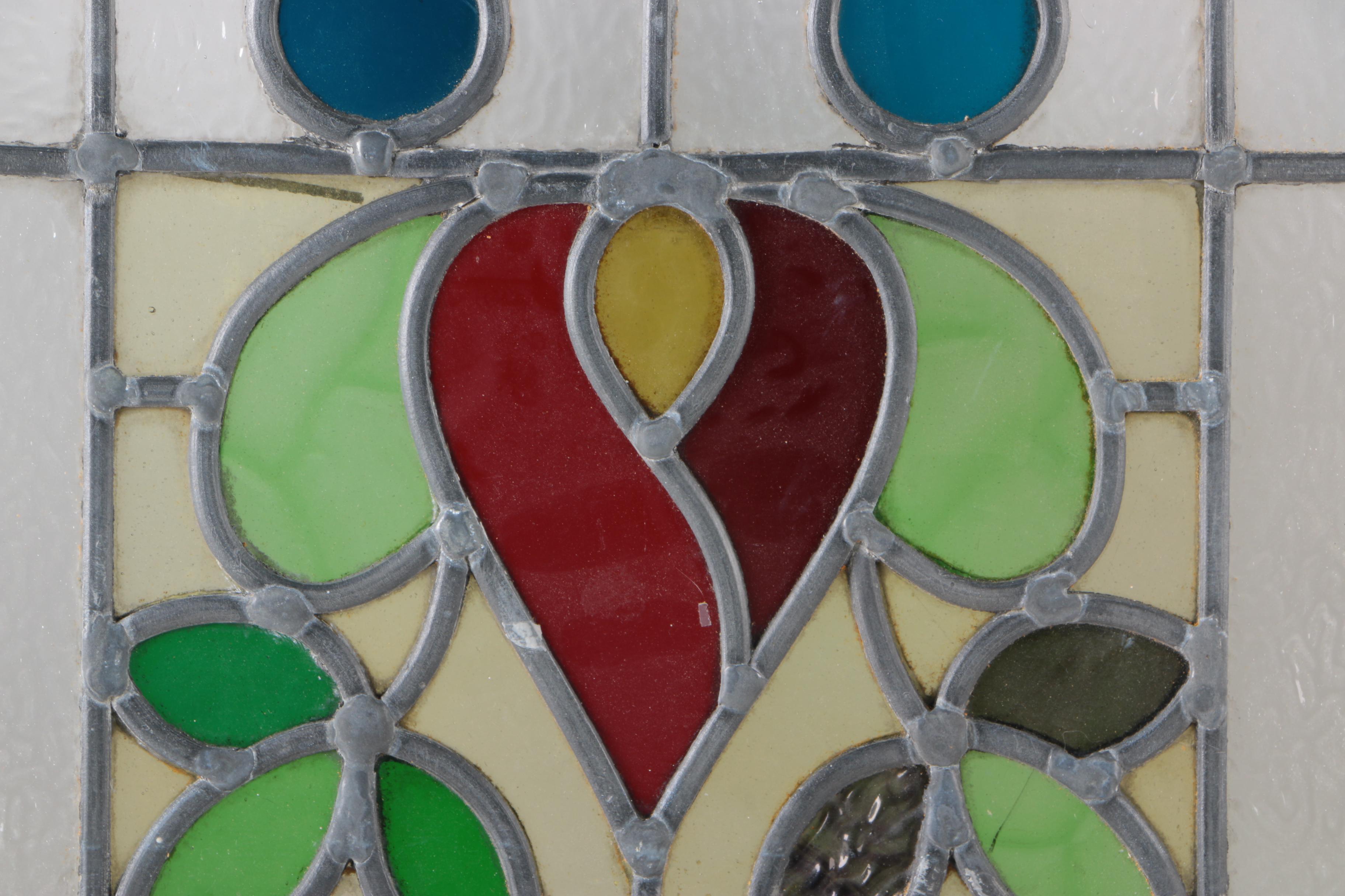Stained Glass Window in White Wood Frame