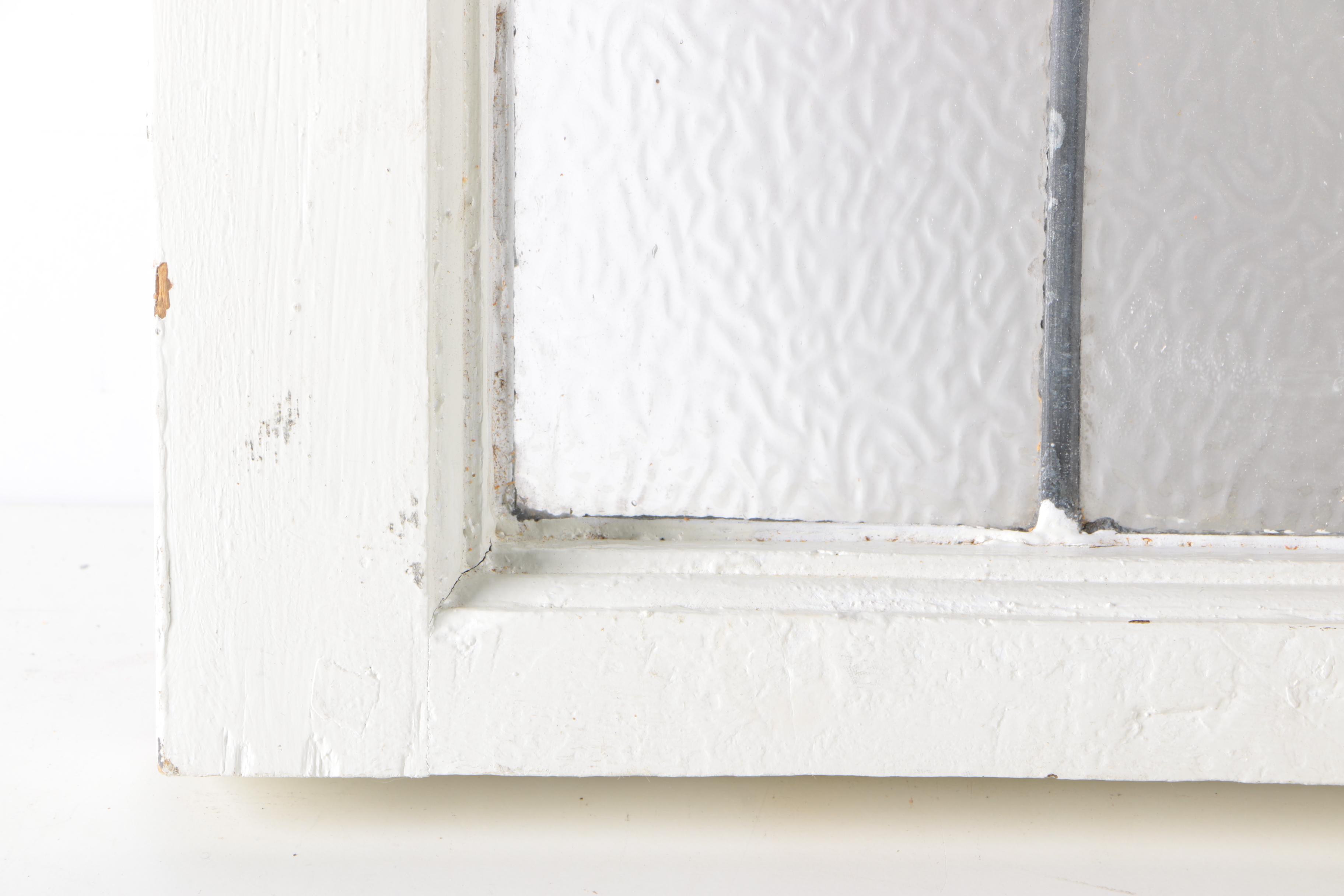 Stained Glass Window in White Wood Frame