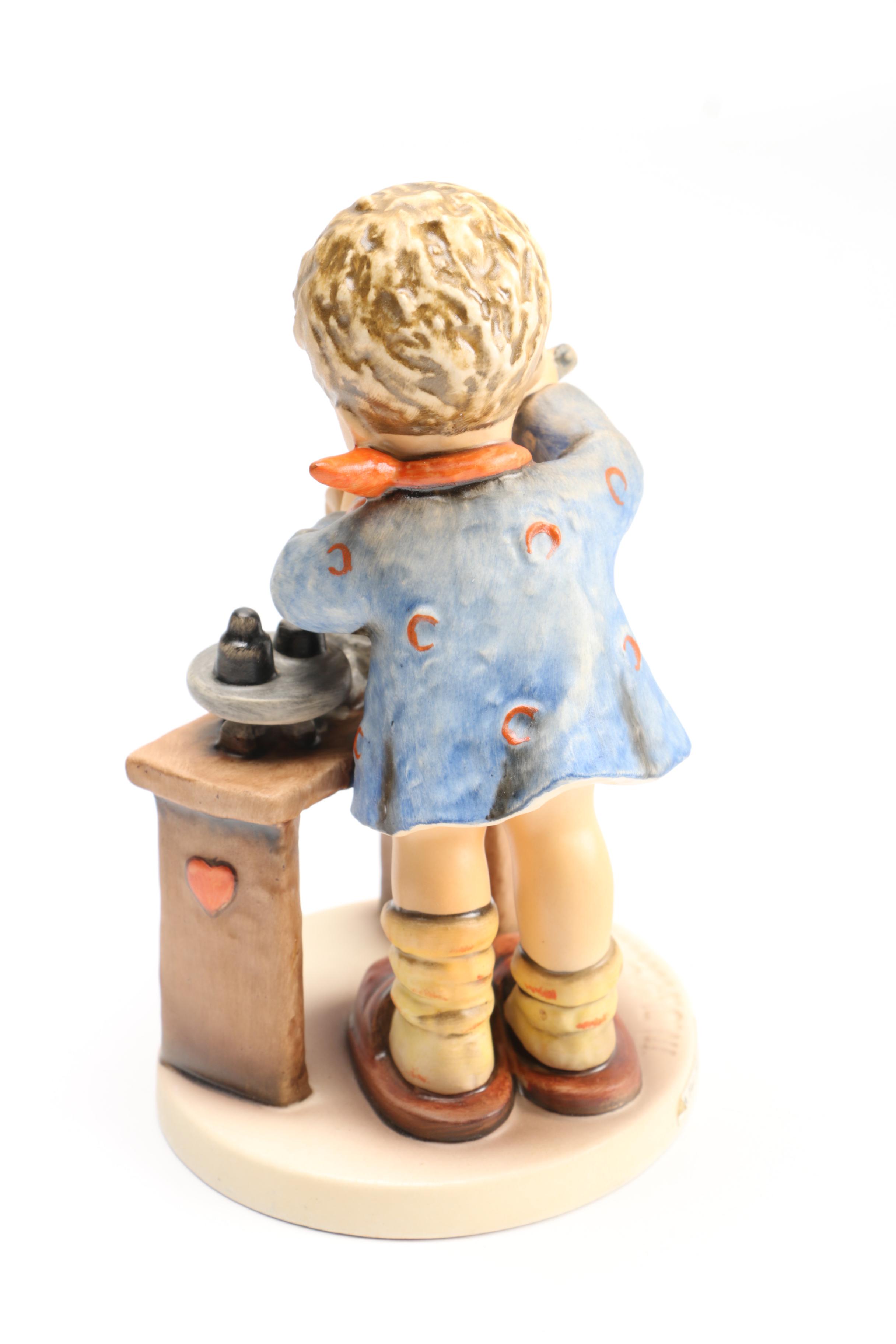 Goebel Hummel Figurines "Sleigh Ride" and "A Fair Measure"