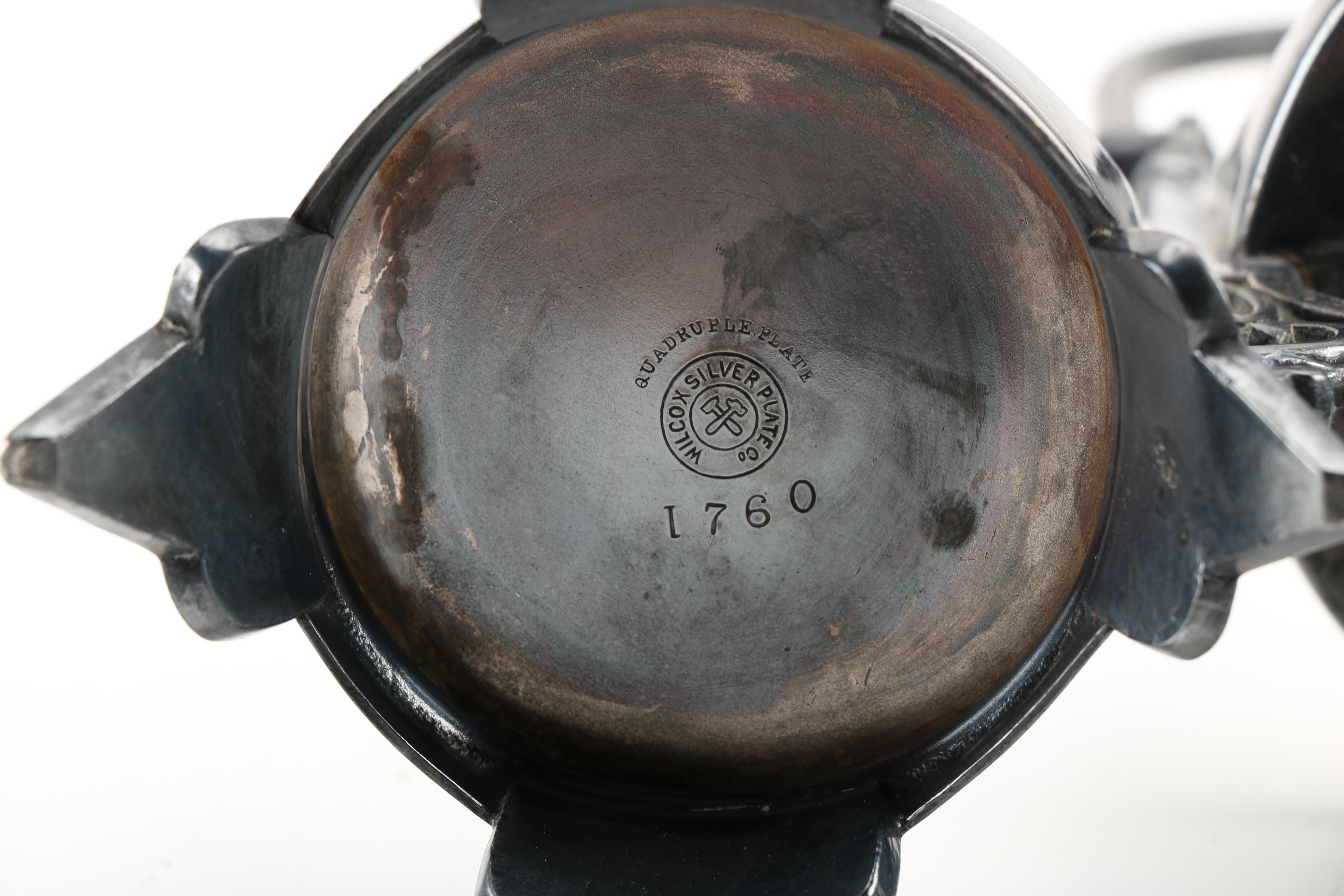 Wilcox Silver Plate Co. Carrier With Rose Tone Vanity Set