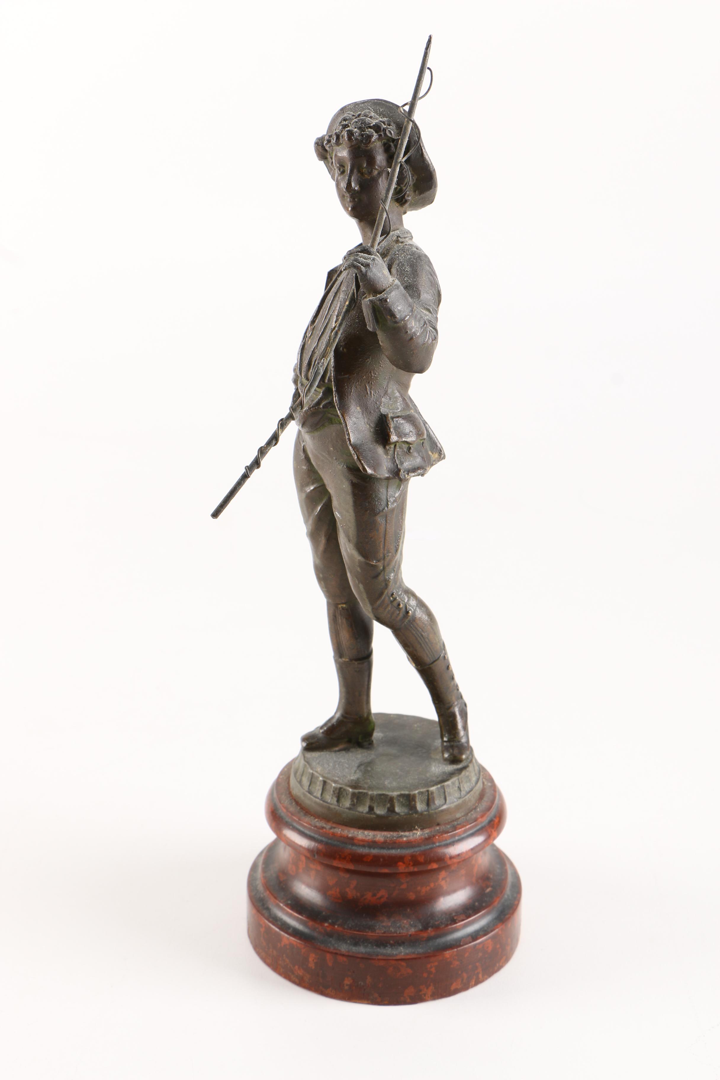 Bronze Toned Metal Sculpture of a Boy