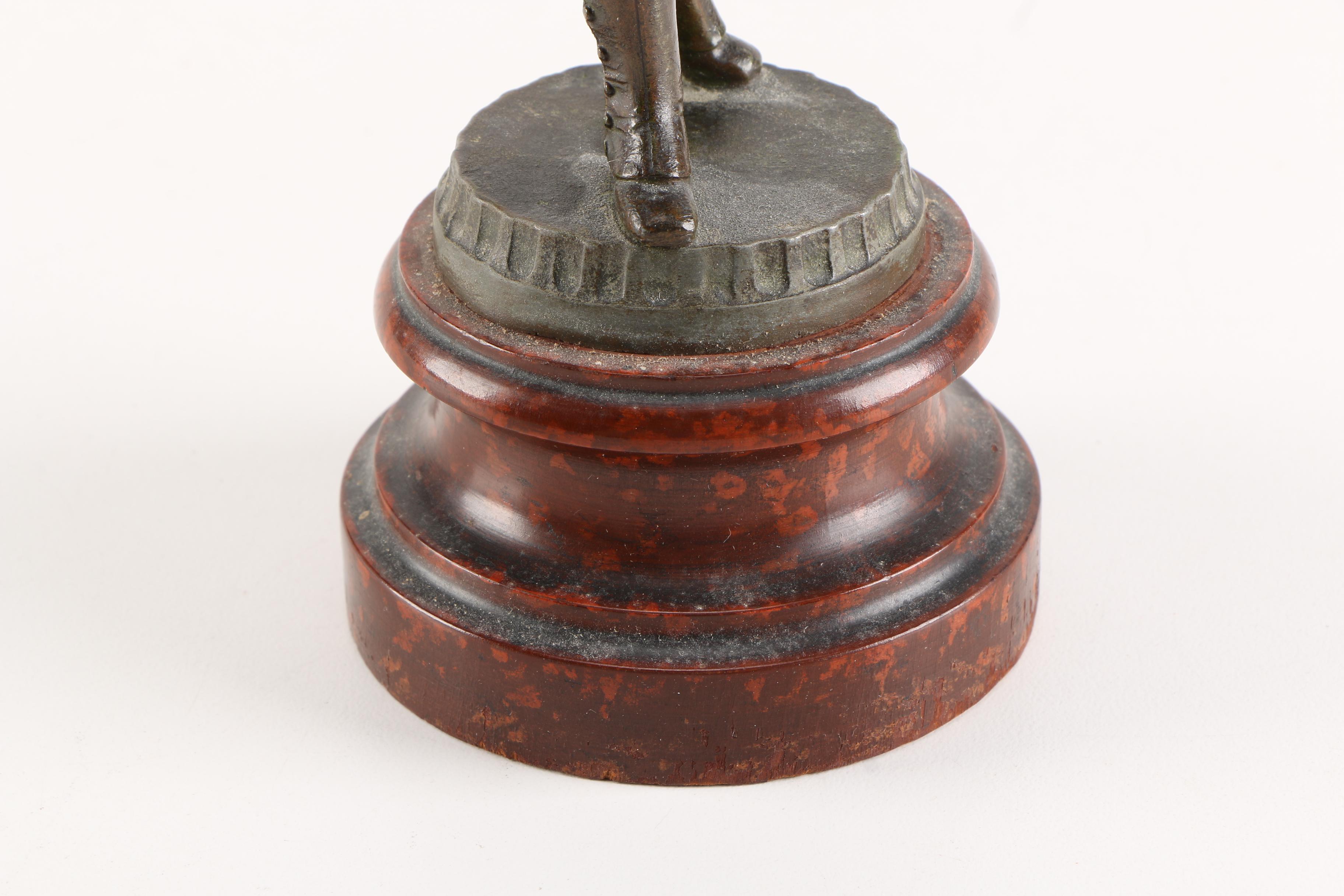 Bronze Toned Metal Sculpture of a Boy
