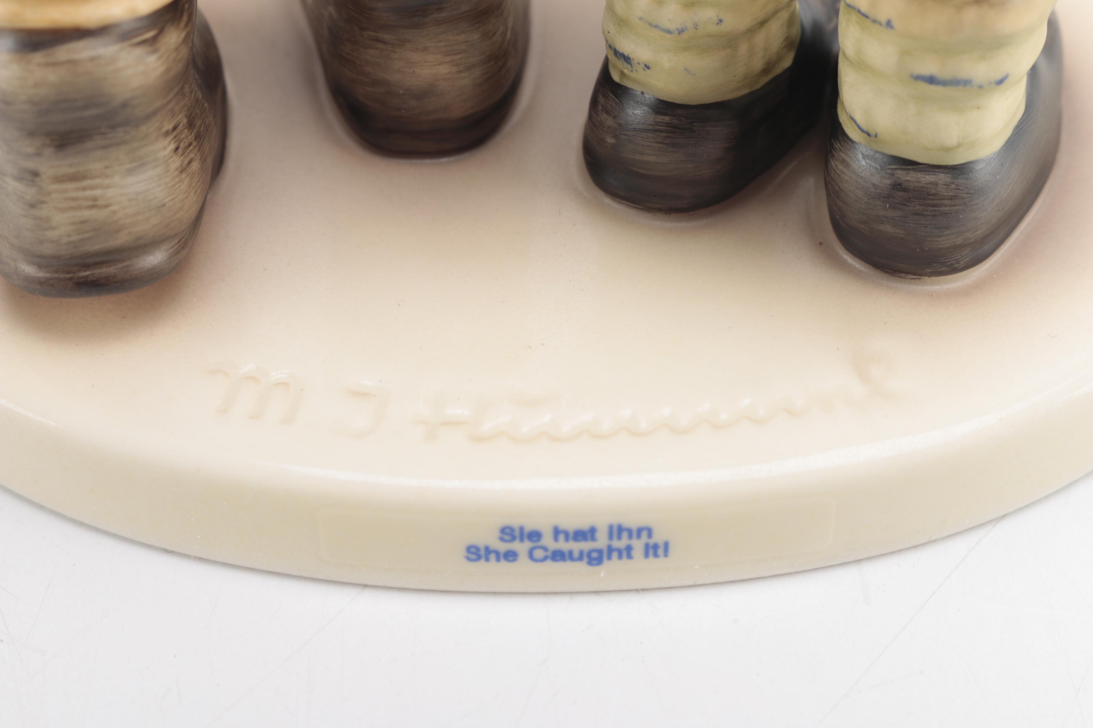 Hummel "She Caught It" Figurine