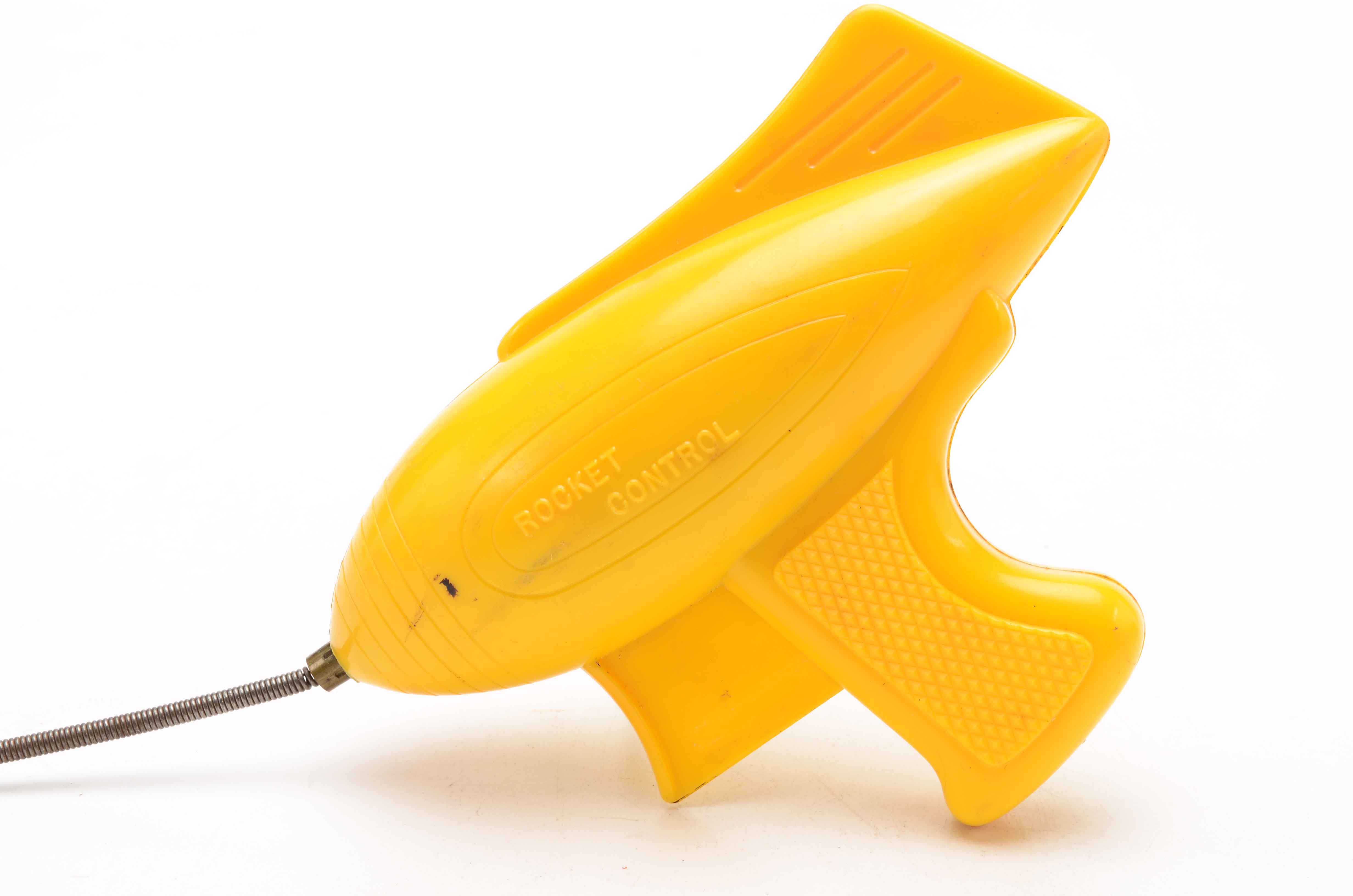 Vintage Blue Car with Yellow Rocket