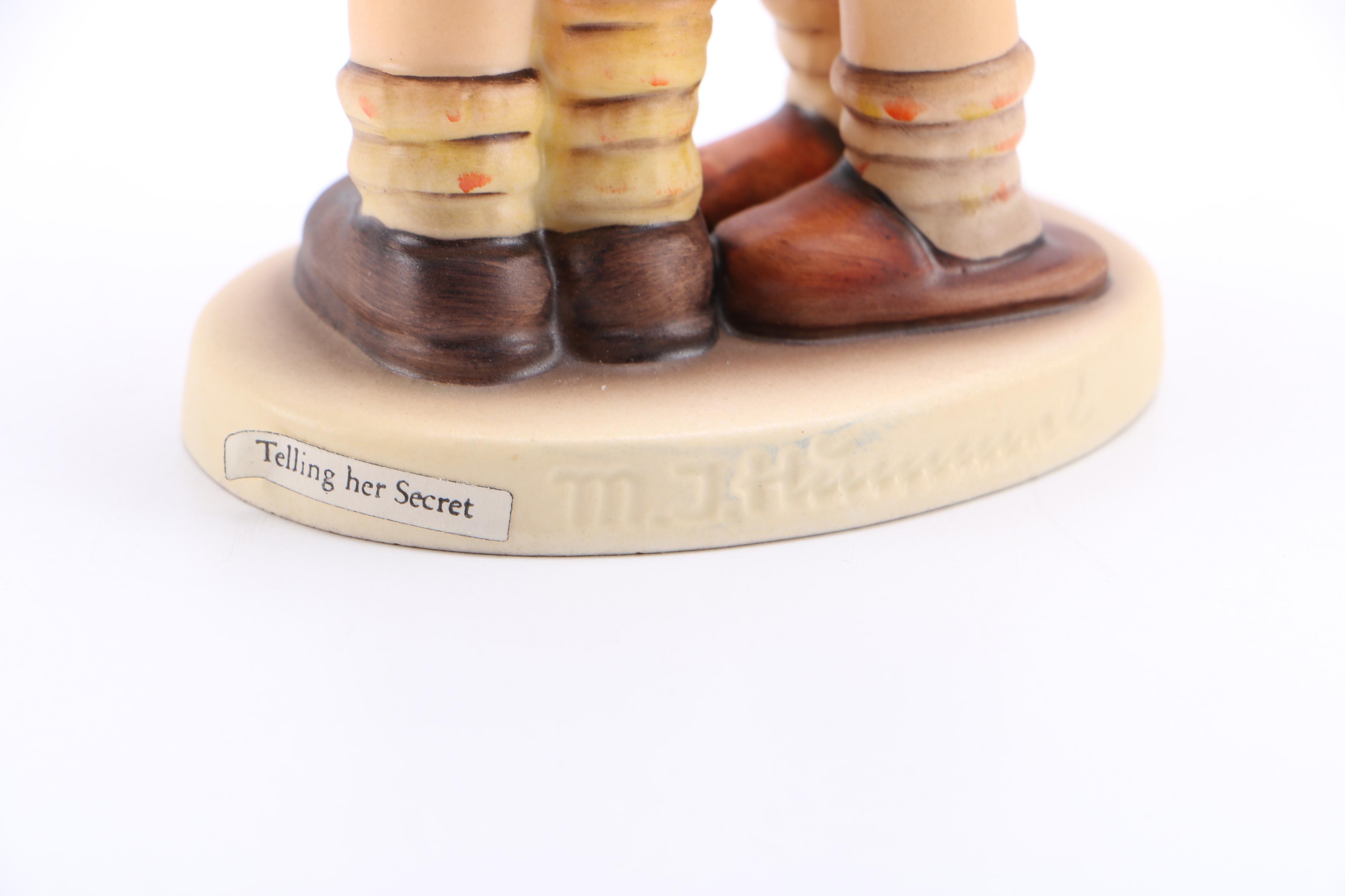 Hummel "Telling Her Secret" Figurine