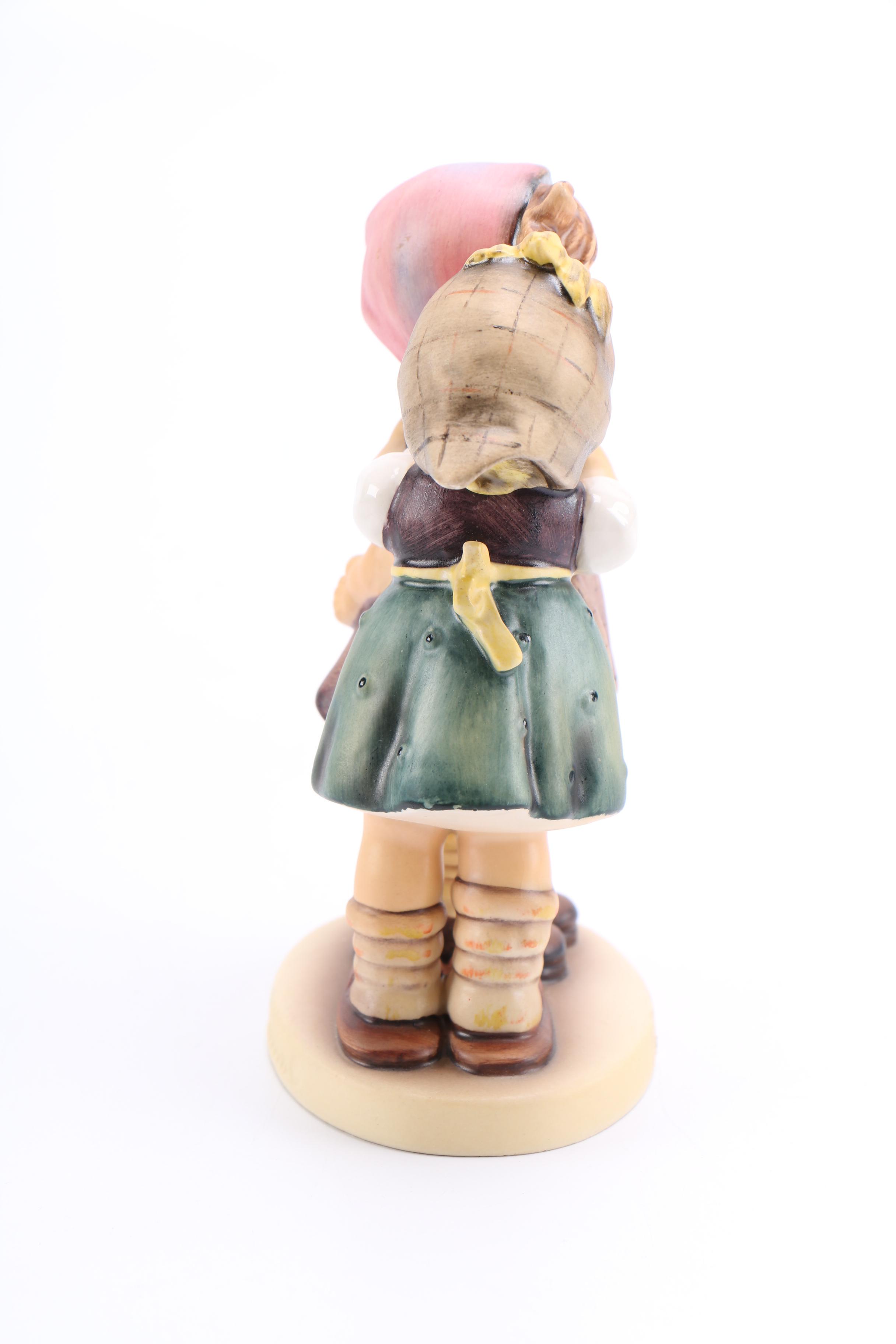 Hummel "Telling Her Secret" Figurine
