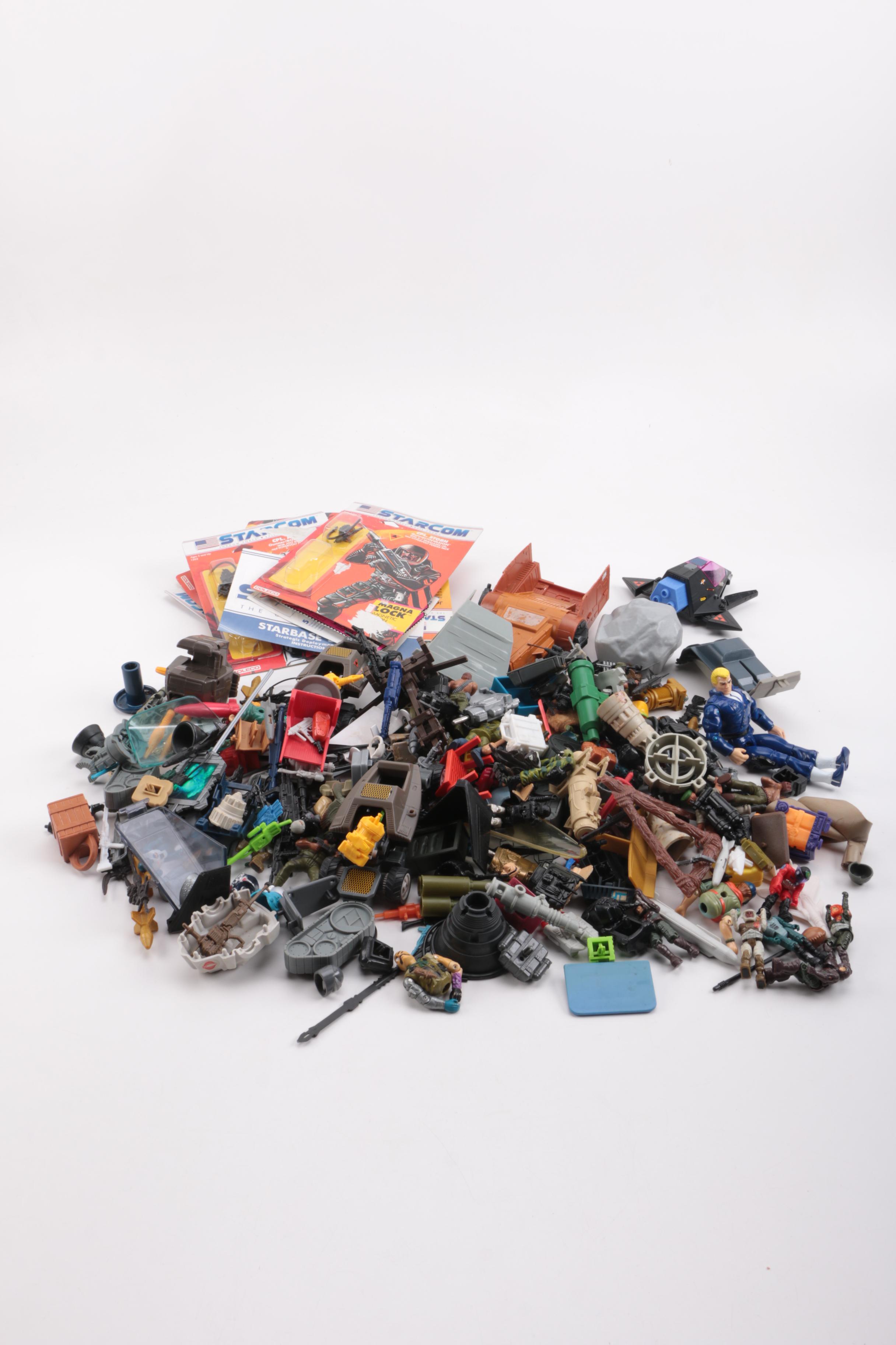 Collection of Starcom Action Figures and Accessories