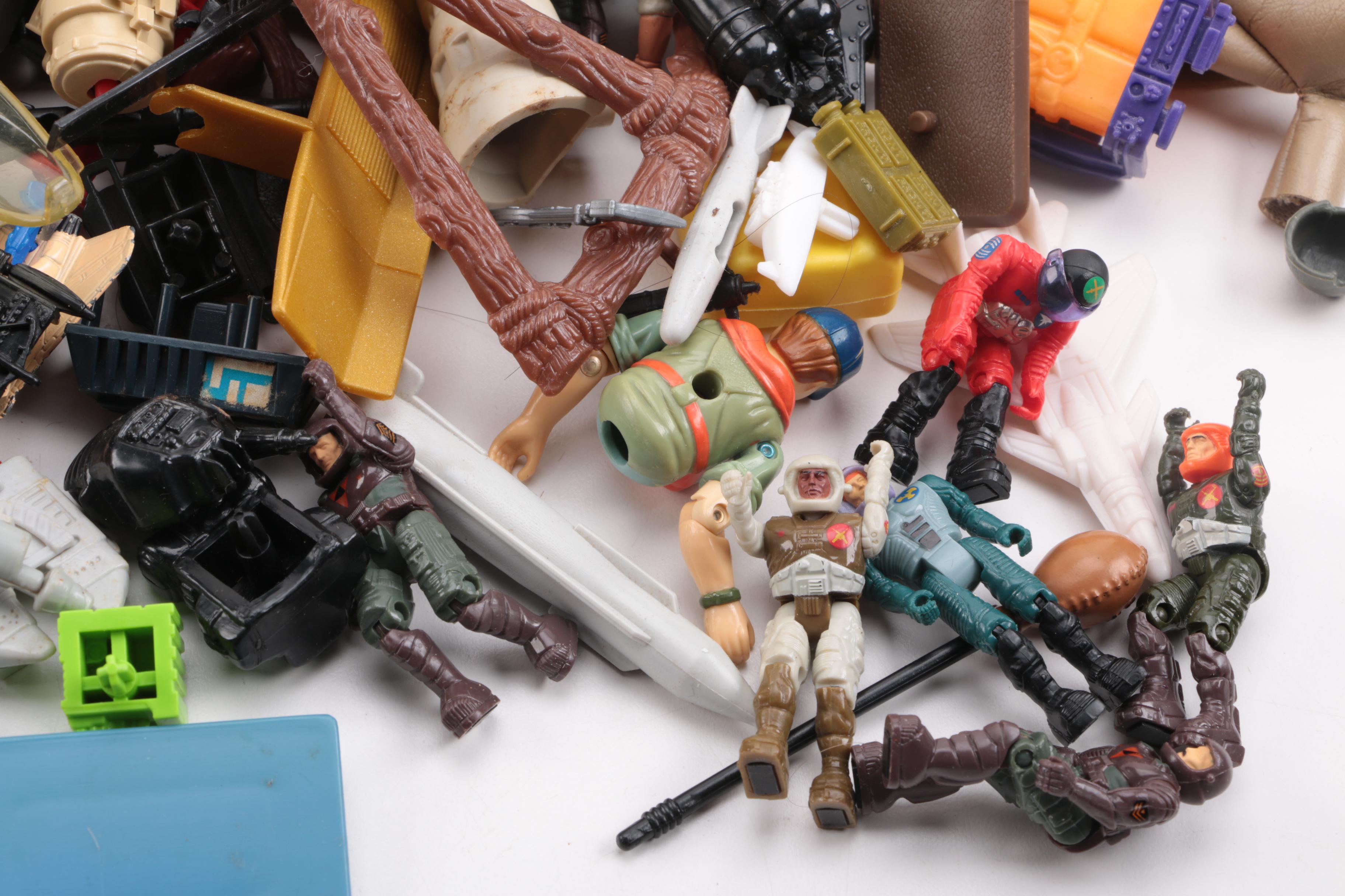 Collection of Starcom Action Figures and Accessories