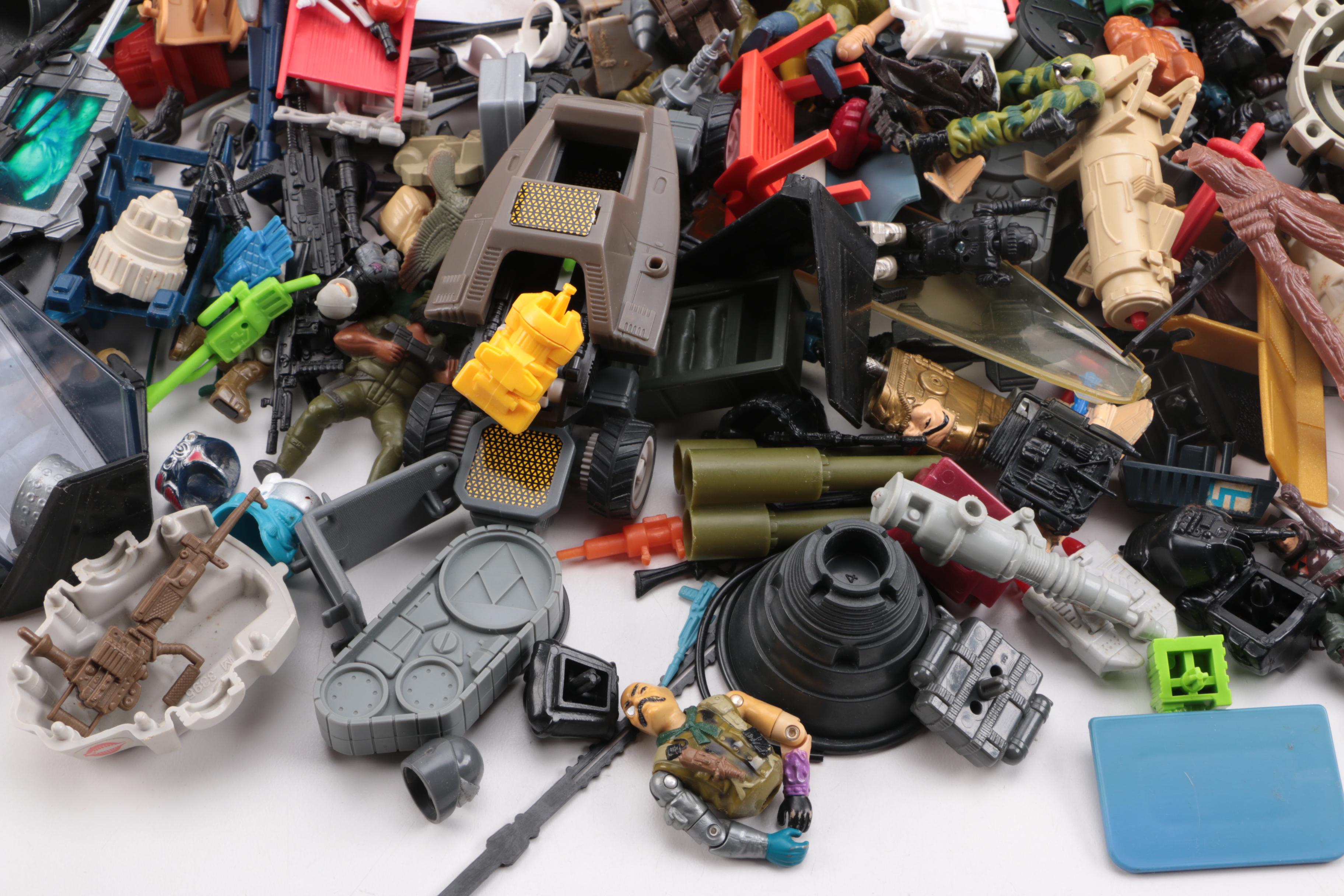 Collection of Starcom Action Figures and Accessories