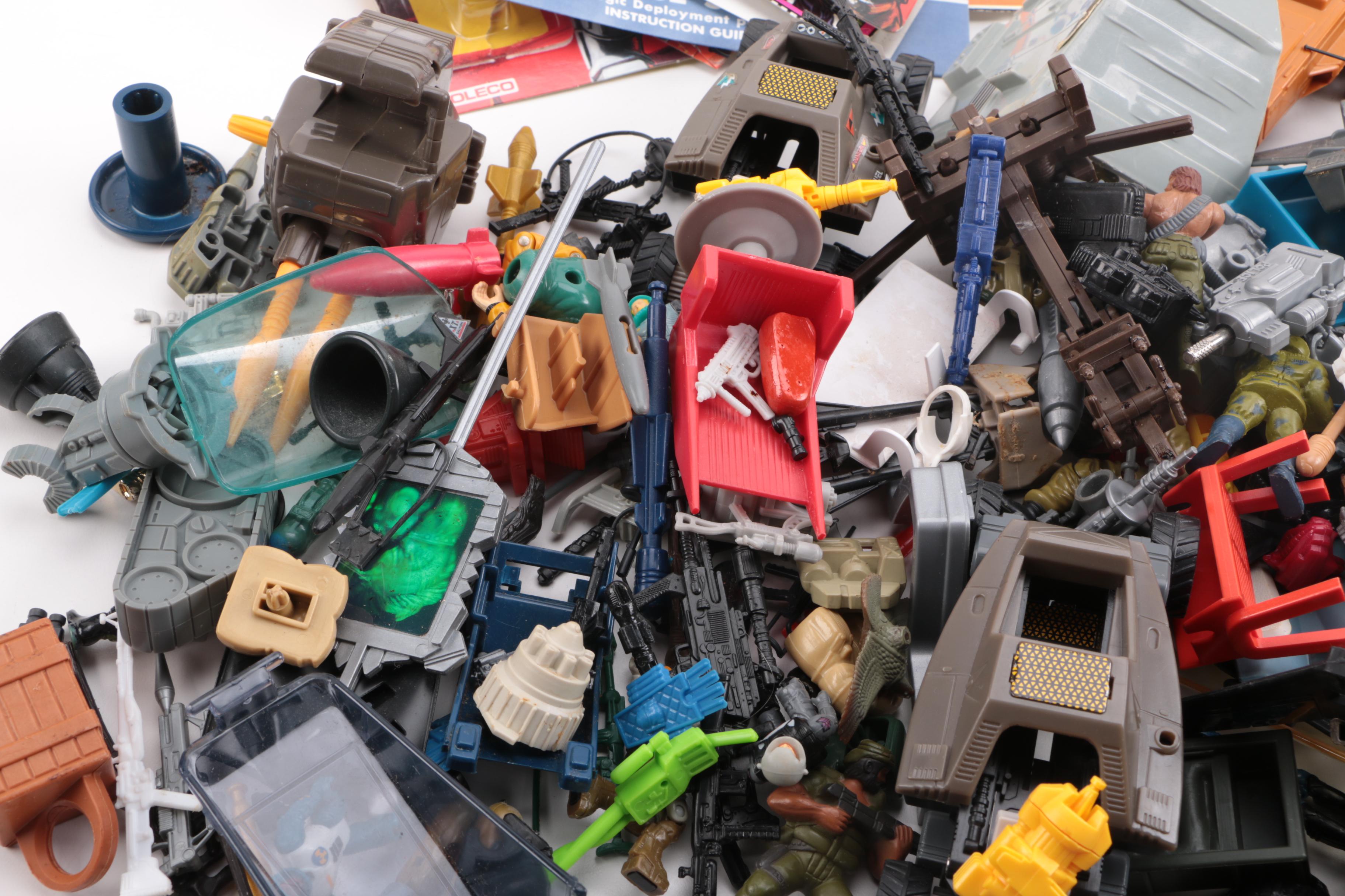 Collection of Starcom Action Figures and Accessories