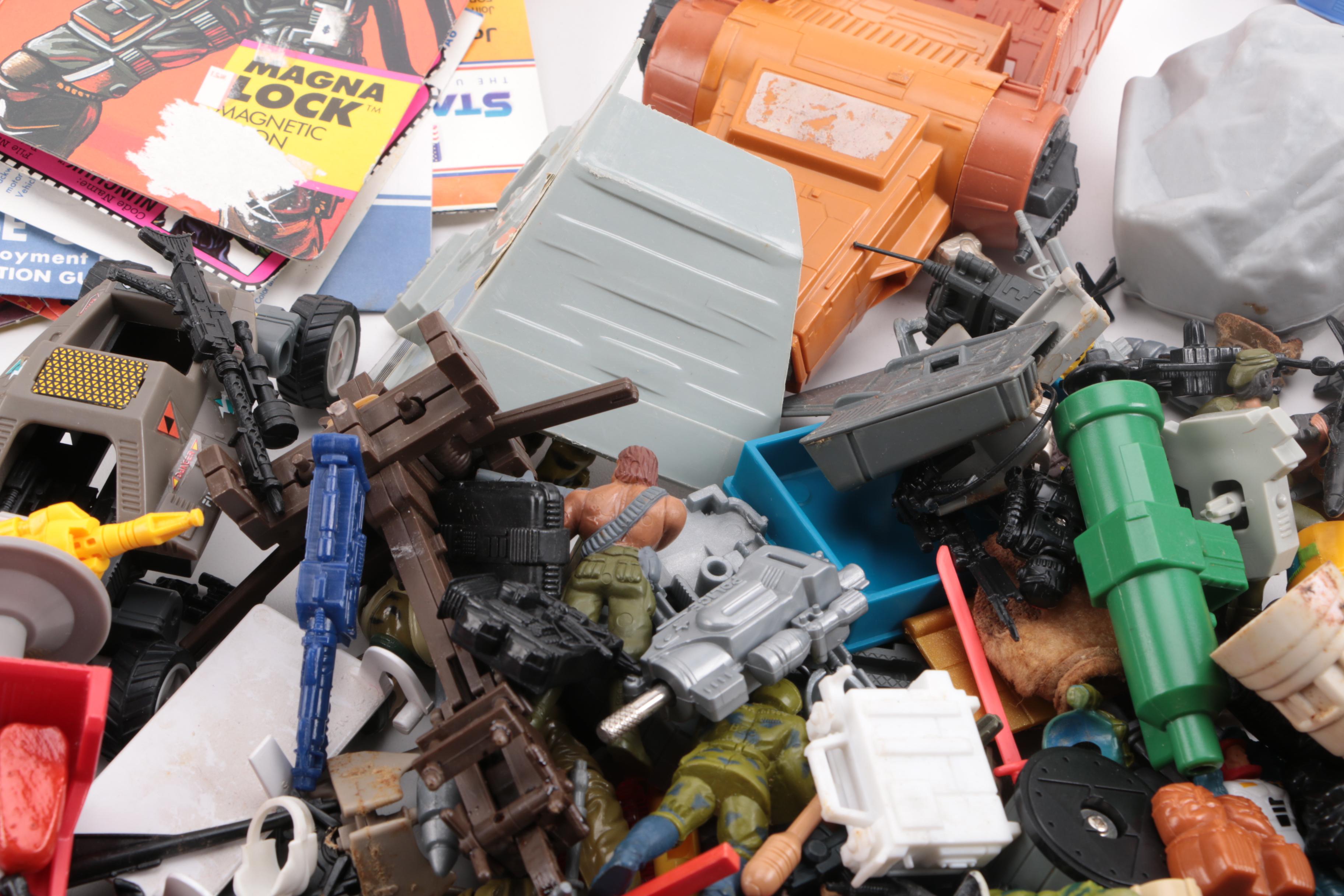 Collection of Starcom Action Figures and Accessories