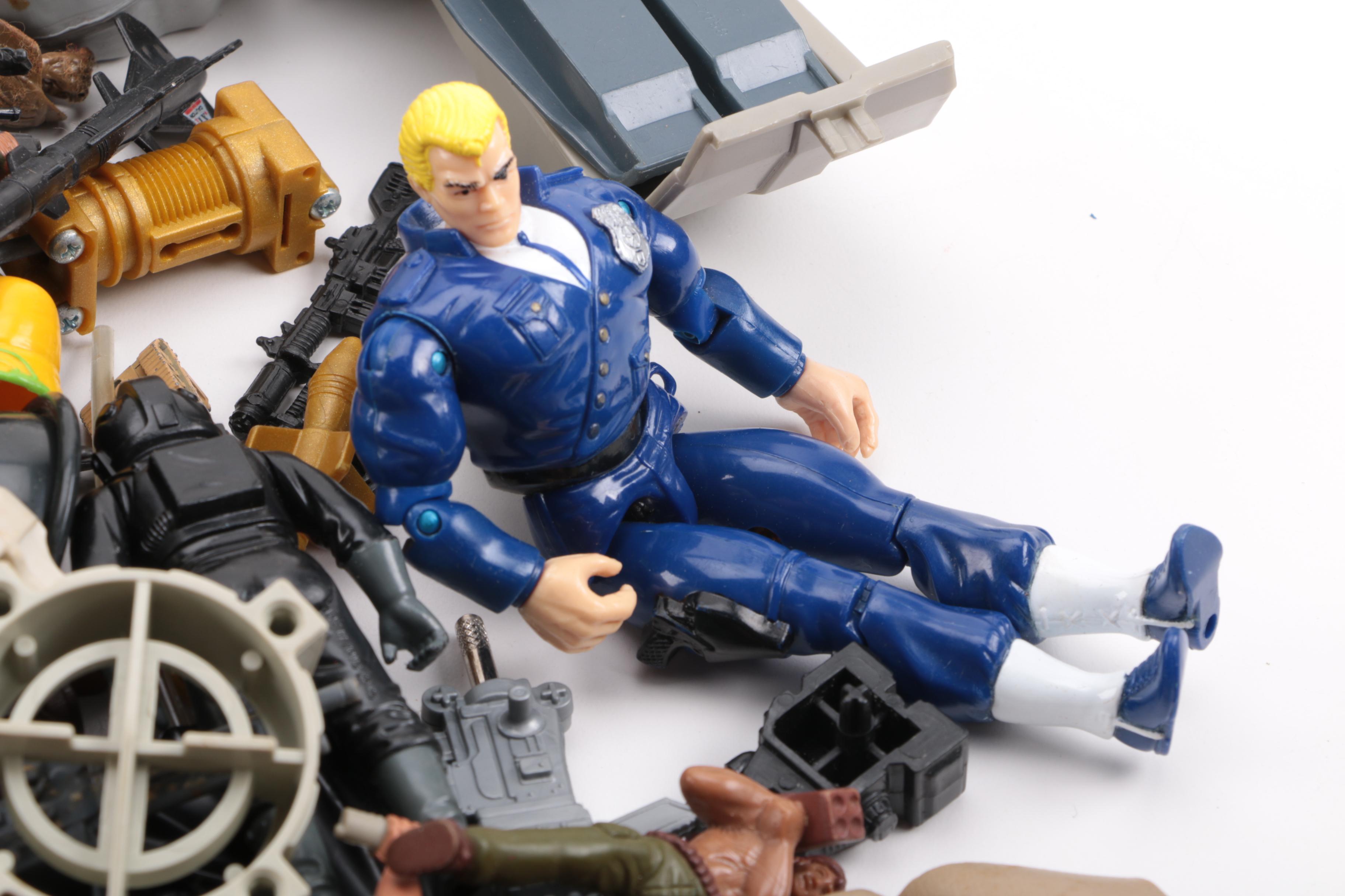 Collection of Starcom Action Figures and Accessories