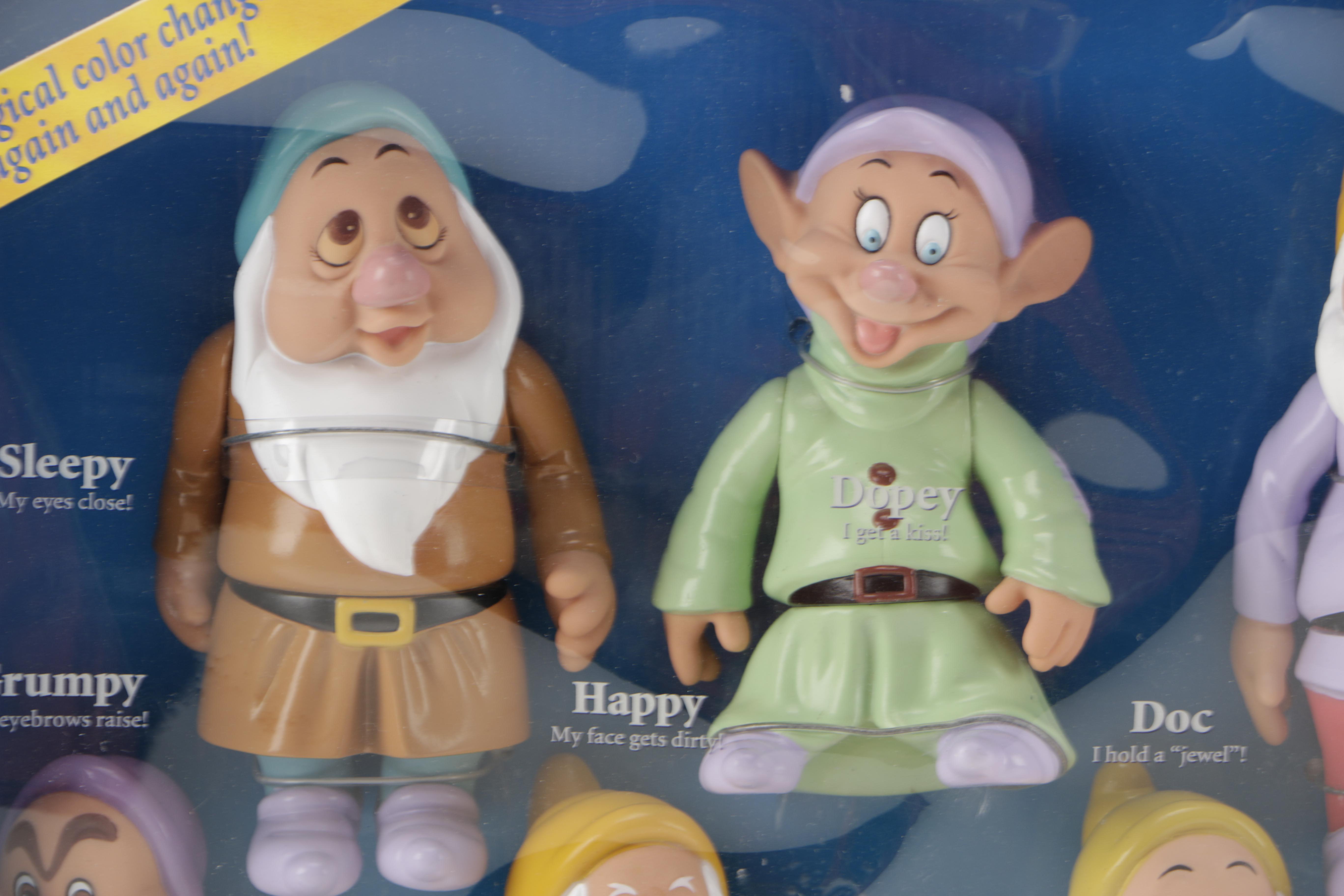Assortment of Disney Co. Character Toys