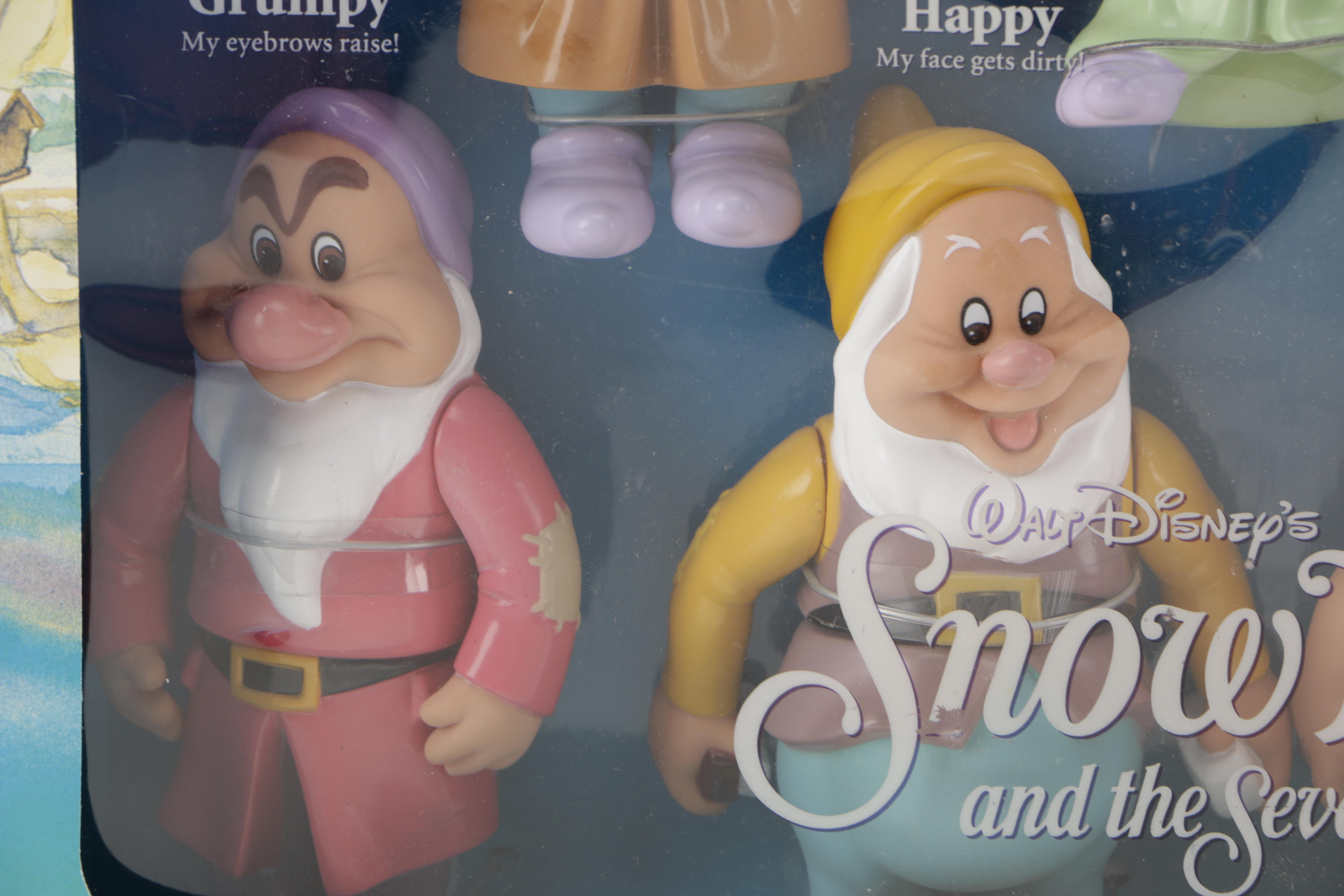 Assortment of Disney Co. Character Toys