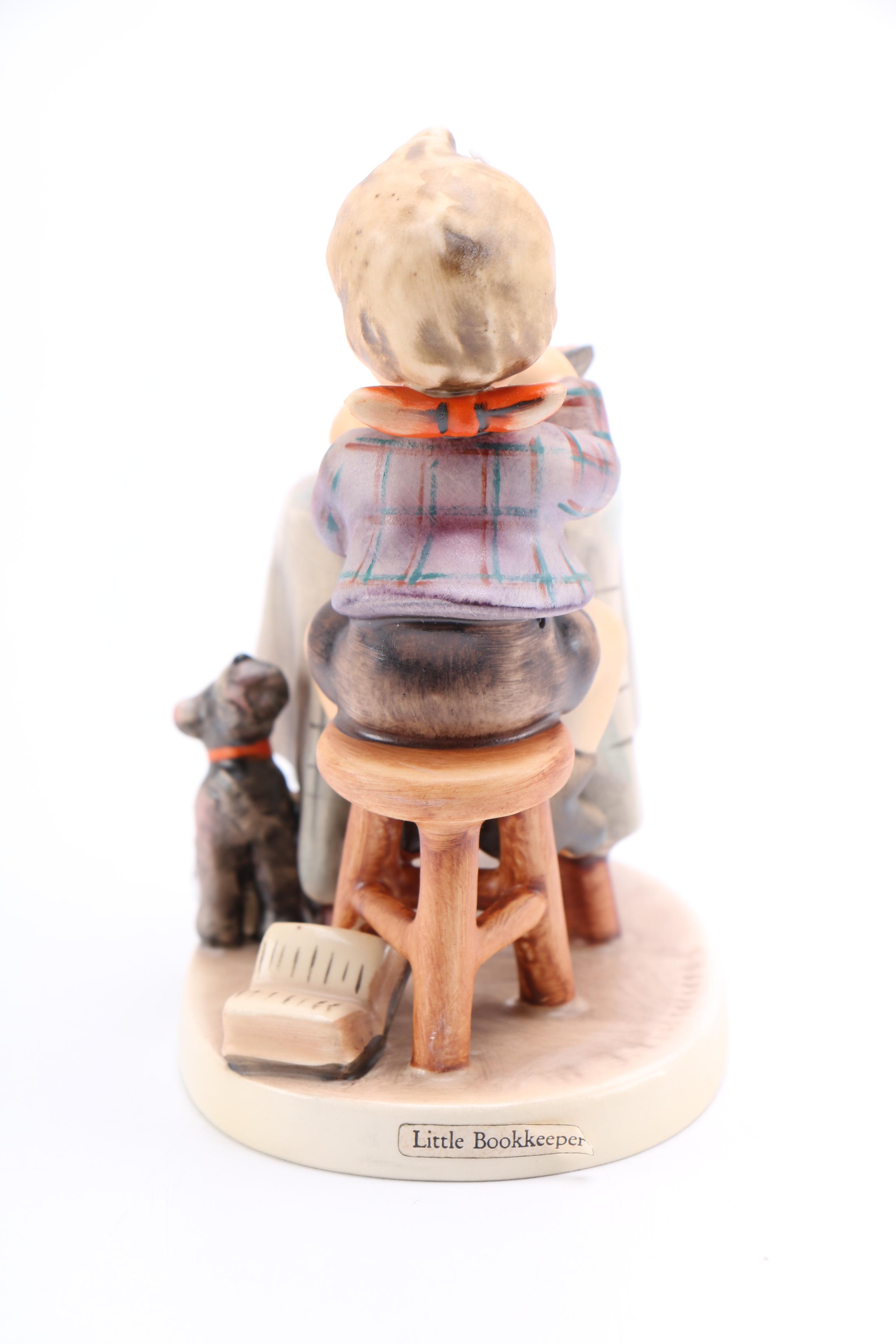 Goebel Hummel Porcelain Figurine of Child and Dog "Little Bookkeeper"